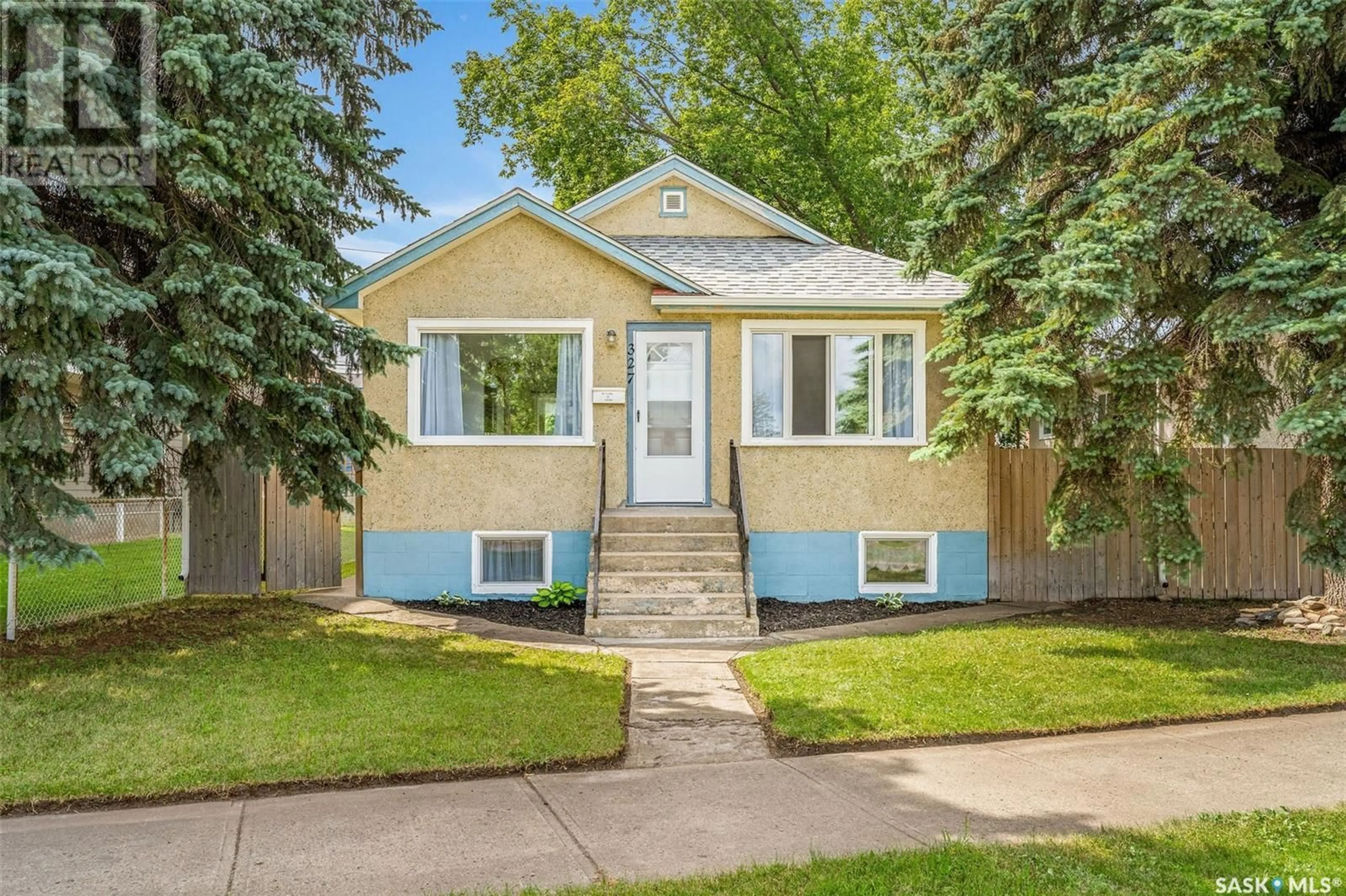 Home with vinyl exterior material, street for 327 RIVER STREET, Prince Albert Saskatchewan S6V0A3