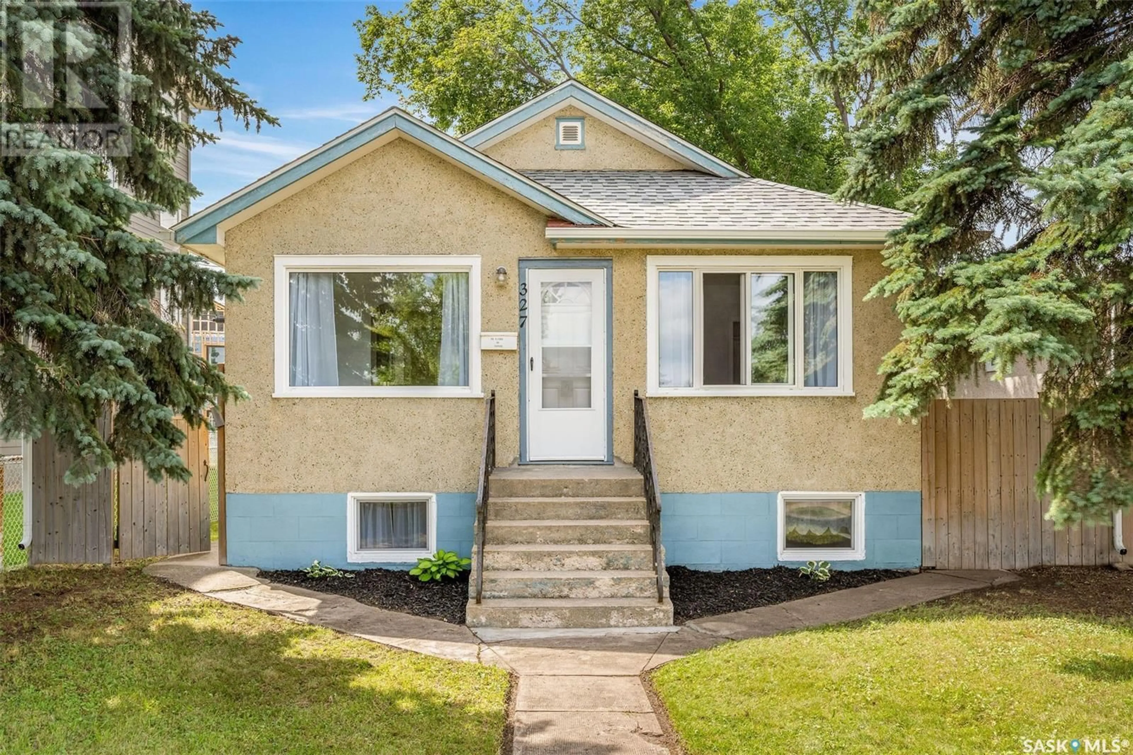 Home with vinyl exterior material, street for 327 RIVER STREET, Prince Albert Saskatchewan S6V0A3