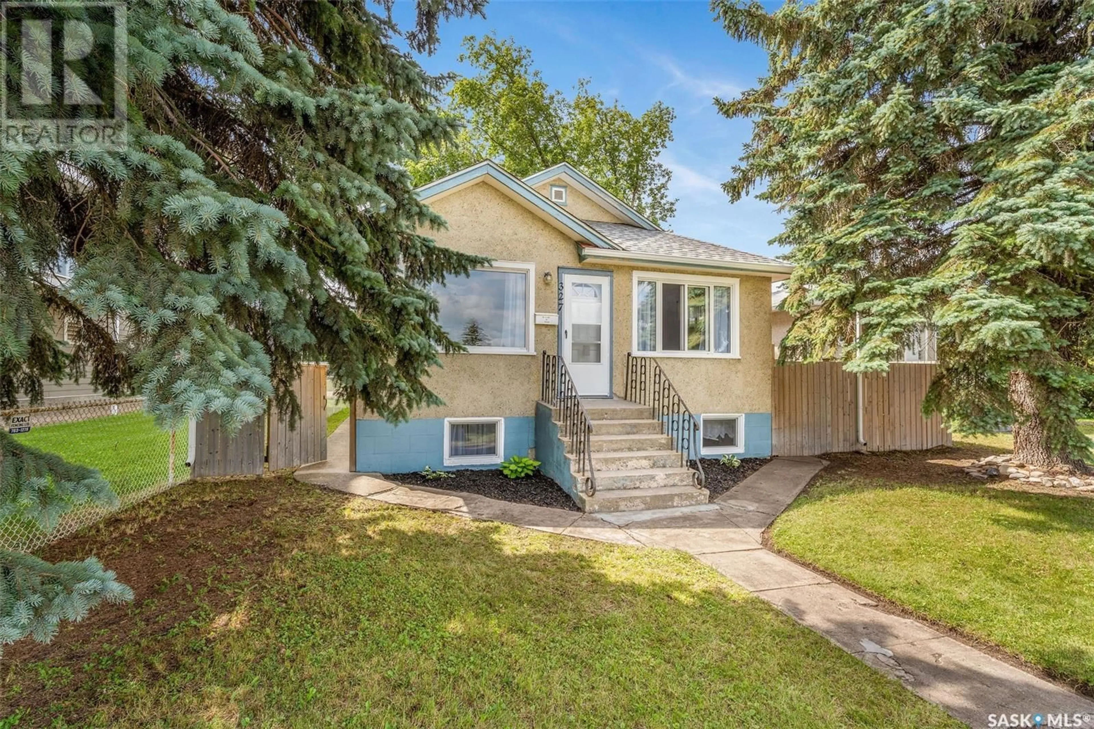 Home with vinyl exterior material, street for 327 RIVER STREET, Prince Albert Saskatchewan S6V0A3