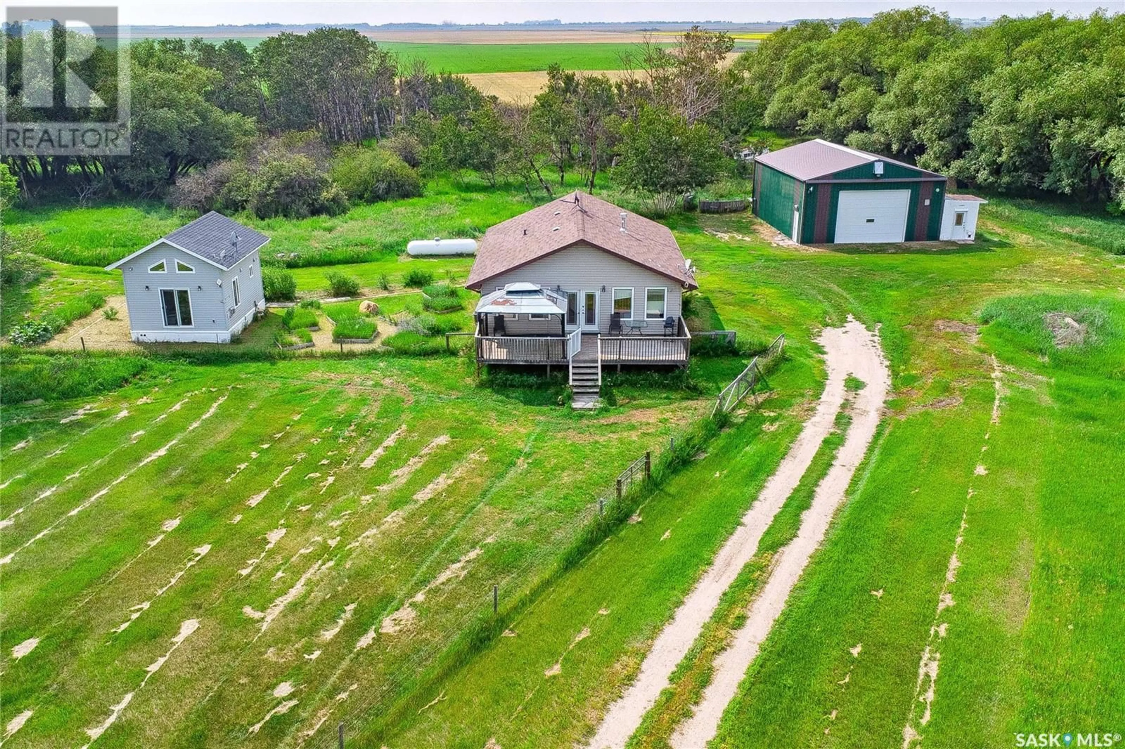 A pic from outside/outdoor area/front of a property/back of a property/a pic from drone, building for NICOL ACREAGE, Vanscoy Rm No. 345 Saskatchewan S0K0J0