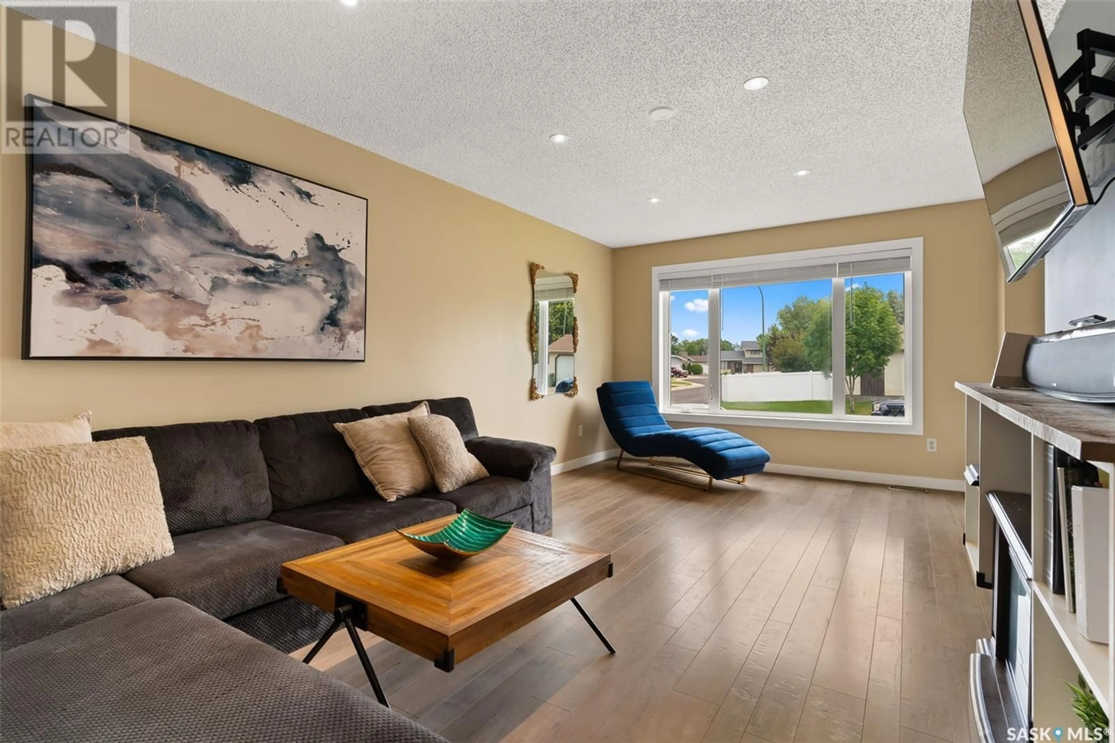 Living room with furniture, wood/laminate floor for 1158 BLACKWOOD STREET, Regina Saskatchewan S4X3X3