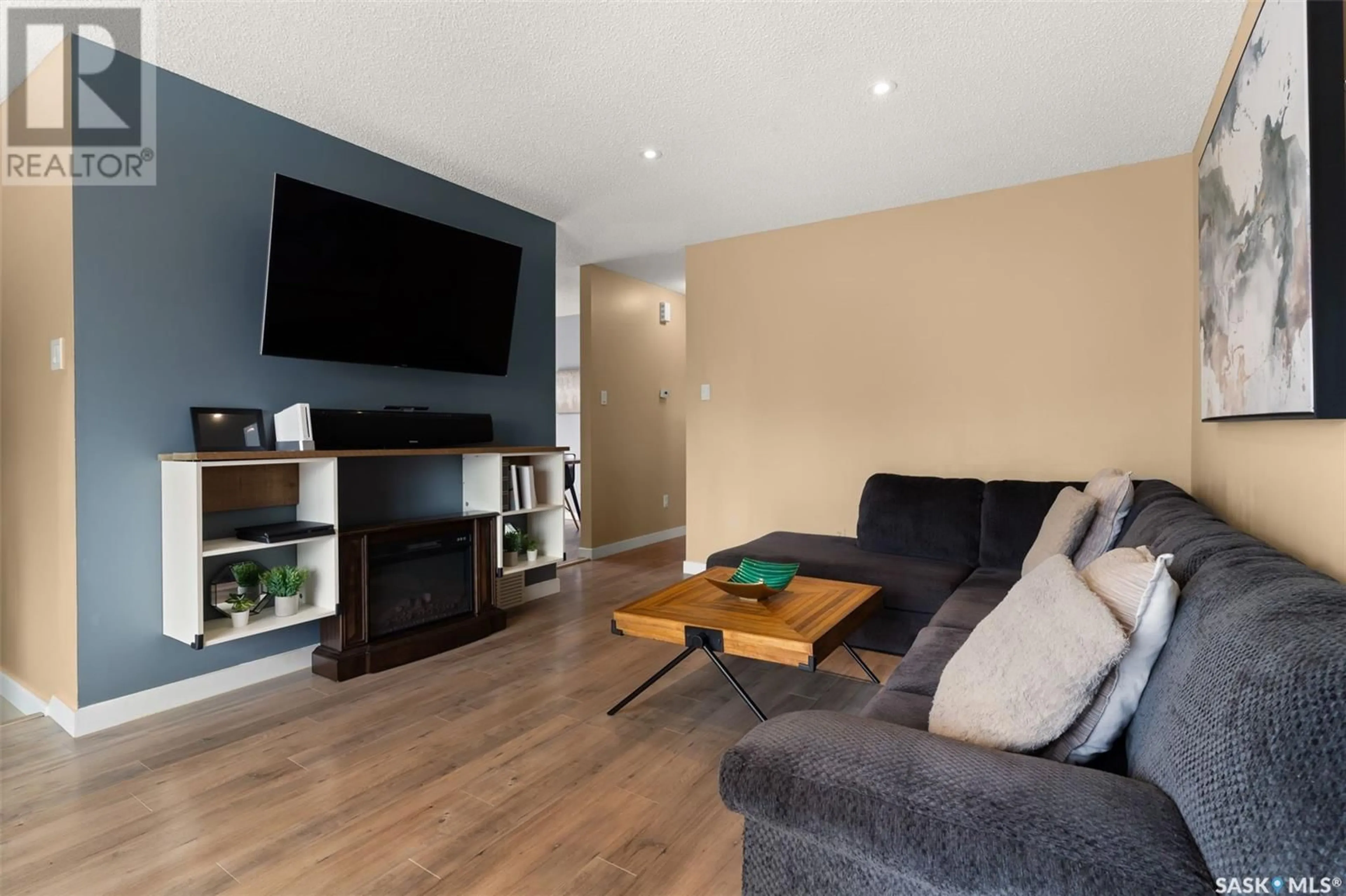 Living room with furniture, wood/laminate floor for 1158 BLACKWOOD STREET, Regina Saskatchewan S4X3X3