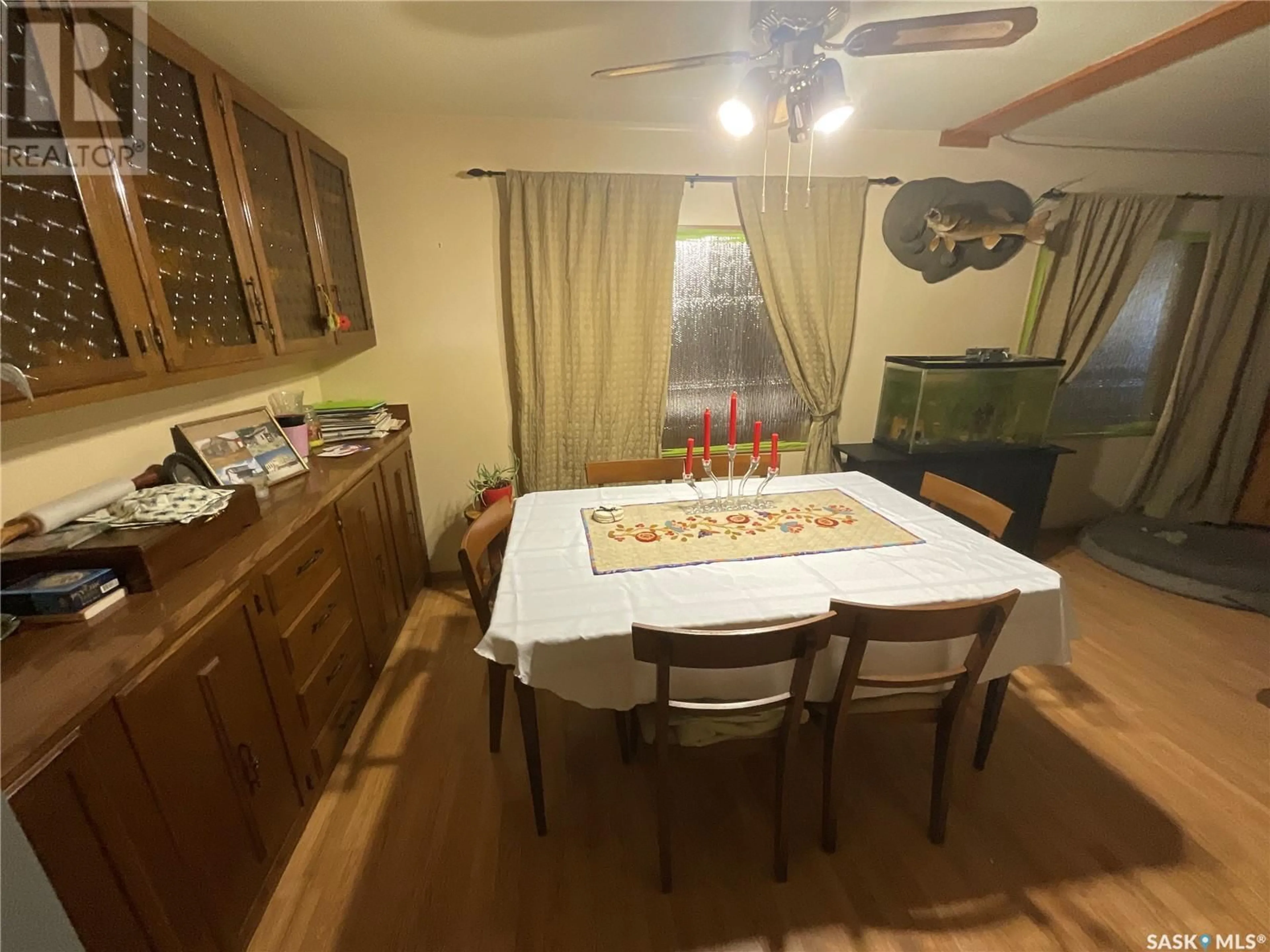 Dining room, wood/laminate floor for 311 MAIN STREET, Borden Saskatchewan S0K0N0