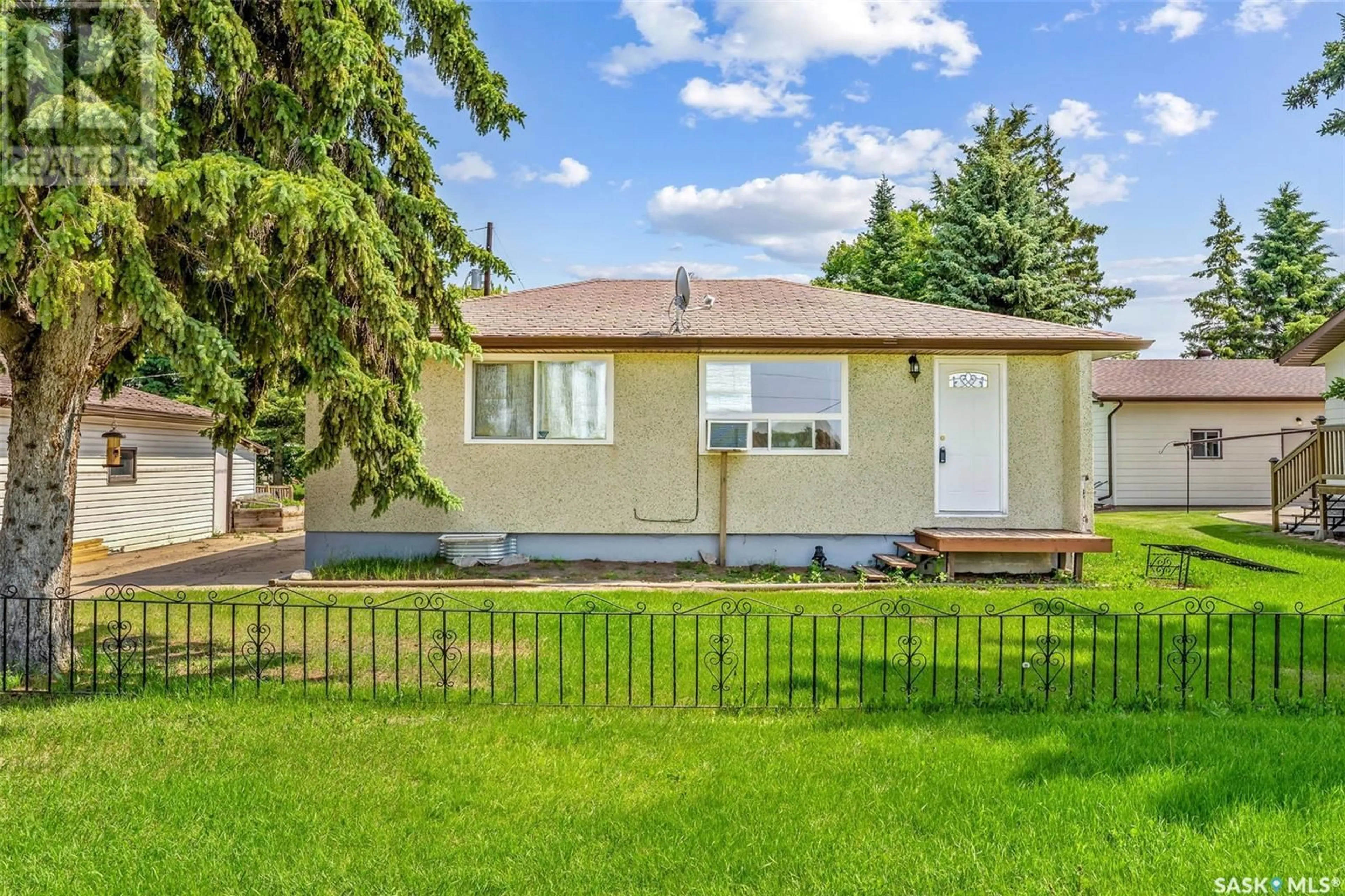 Home with vinyl exterior material, street for 104 2ND STREET, Meath Park Saskatchewan S0J1T0