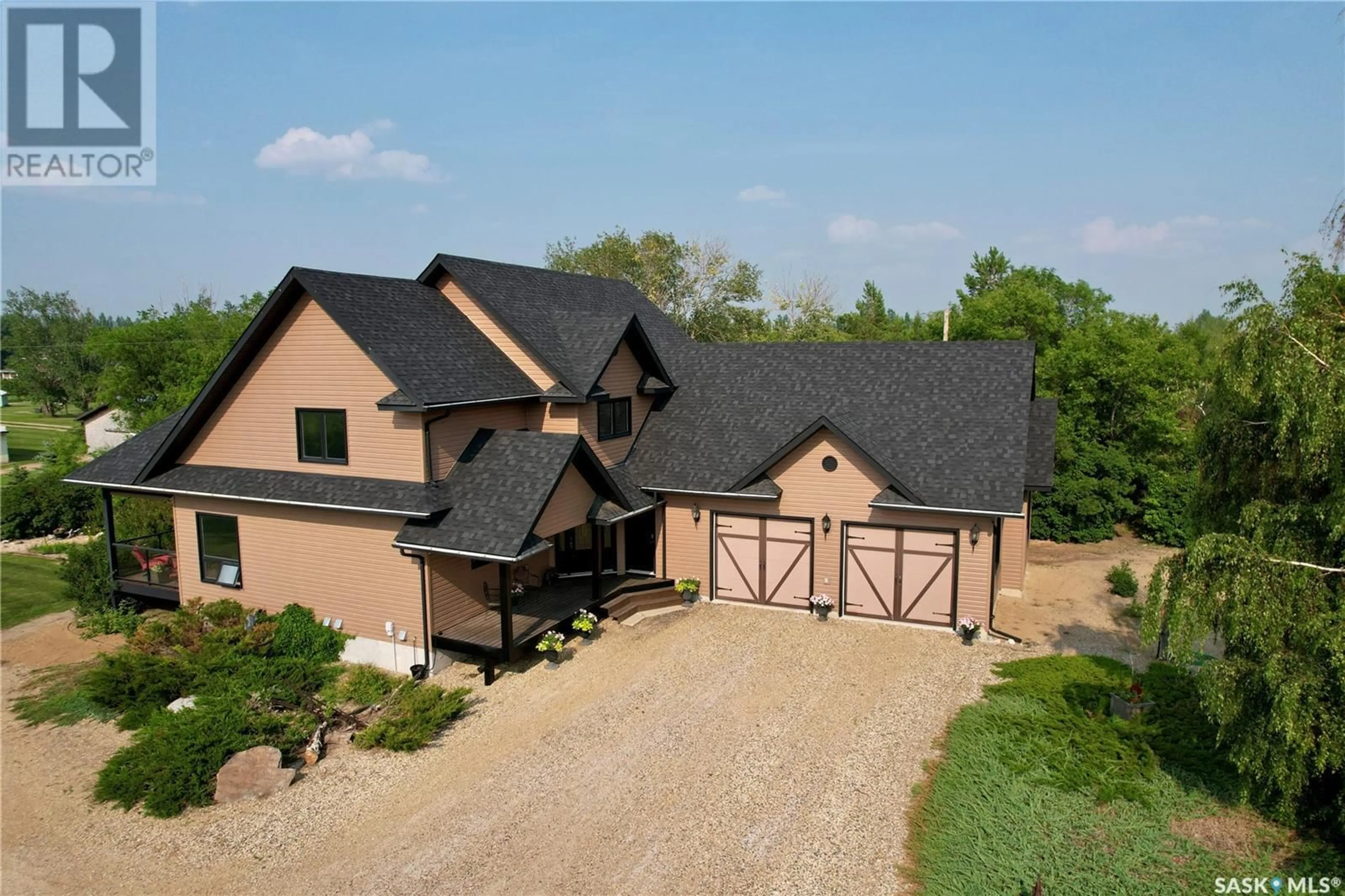 A pic from outside/outdoor area/front of a property/back of a property/a pic from drone, street for 110 WIND RIVER ESTATES, Blucher Rm No. 343 Saskatchewan S0K0Y0