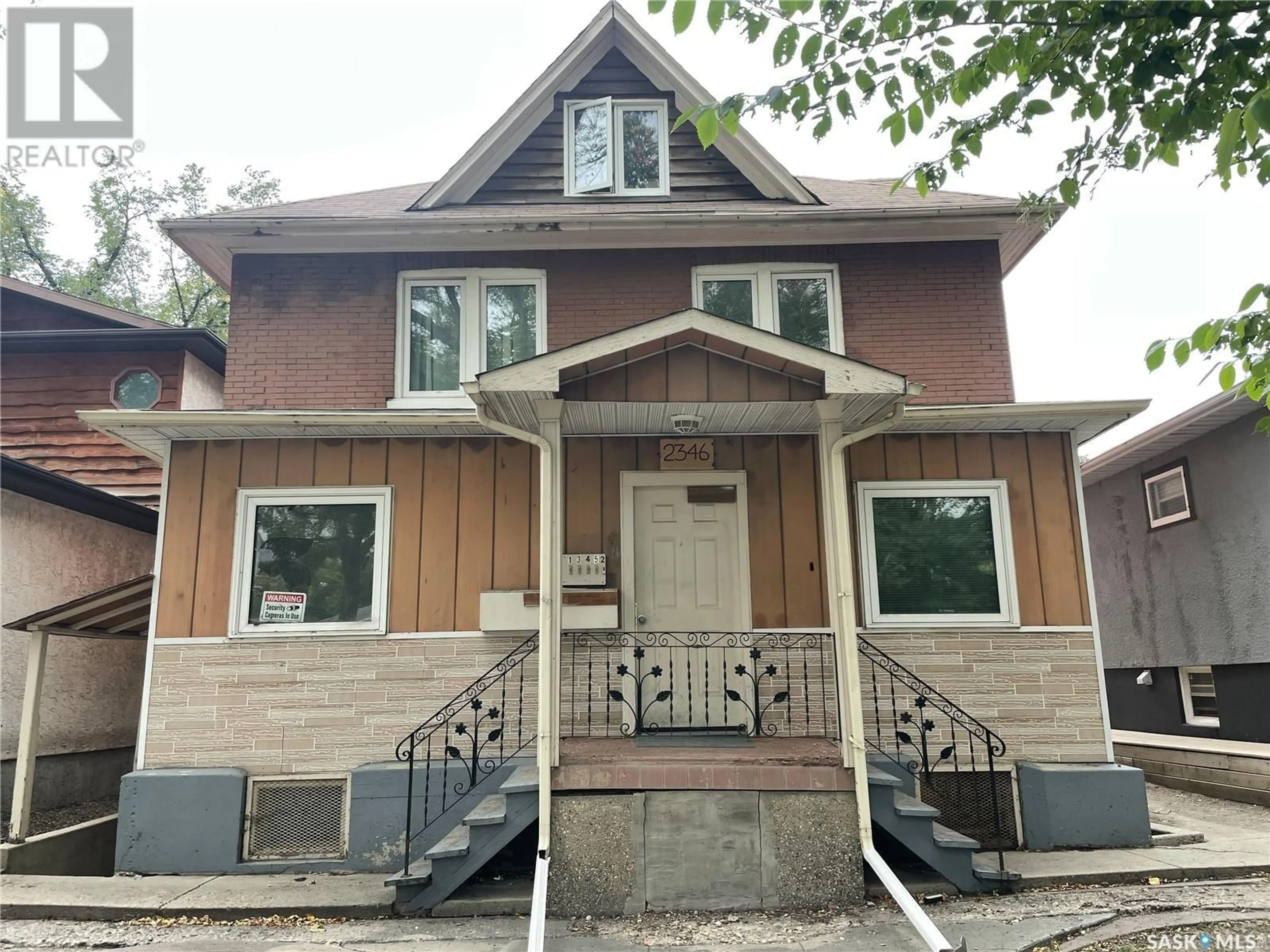 Home with vinyl exterior material, street for 2346 WINNIPEG STREET, Regina Saskatchewan S4P1H3