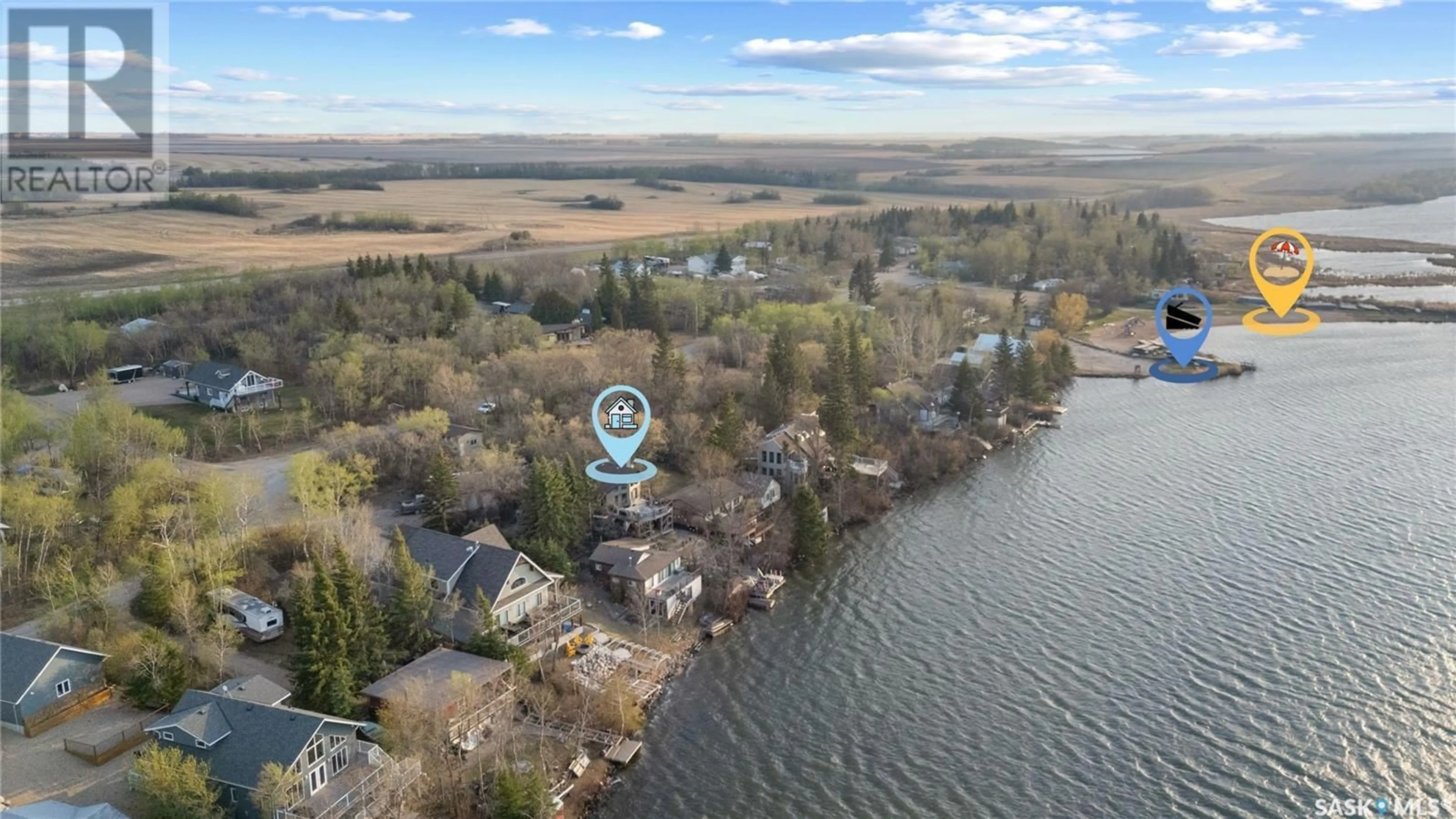 A pic from outside/outdoor area/front of a property/back of a property/a pic from drone, water/lake/river/ocean view for 97 BYNG AVENUE, Wakaw Lake Saskatchewan S0K4P0