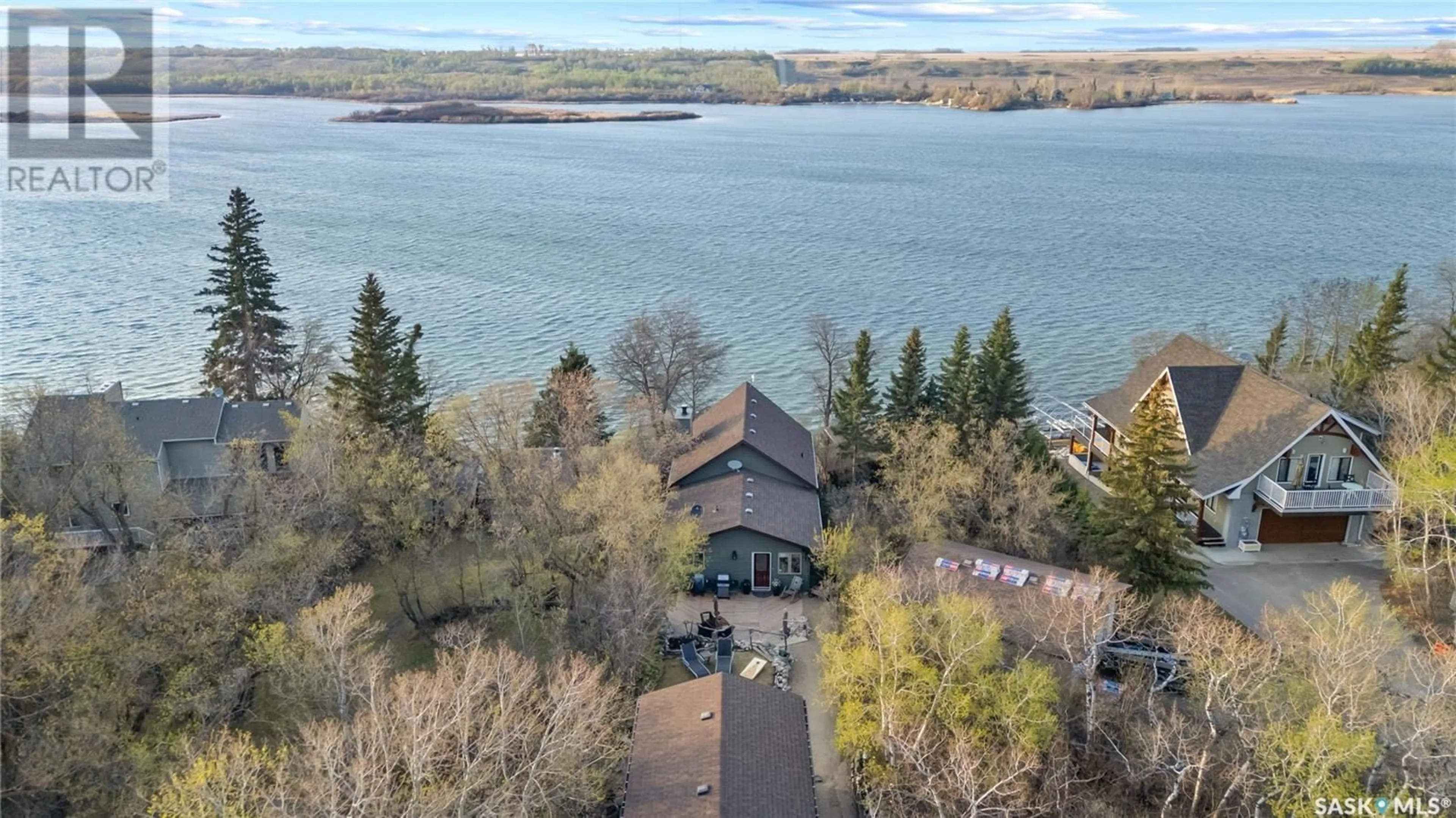 A pic from outside/outdoor area/front of a property/back of a property/a pic from drone, water/lake/river/ocean view for 97 BYNG AVENUE, Wakaw Lake Saskatchewan S0K4P0