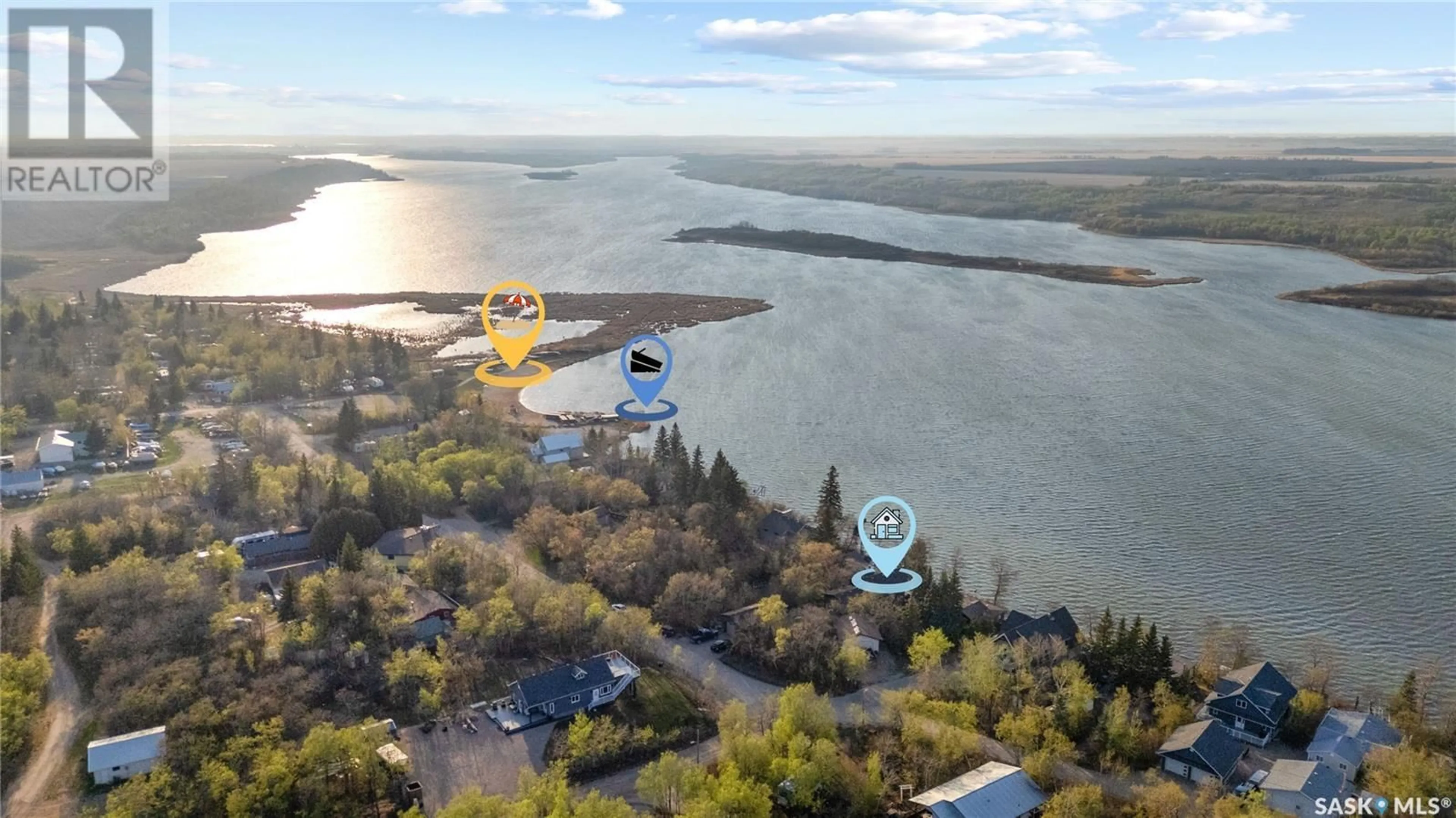 A pic from outside/outdoor area/front of a property/back of a property/a pic from drone, water/lake/river/ocean view for 97 BYNG AVENUE, Wakaw Lake Saskatchewan S0K4P0