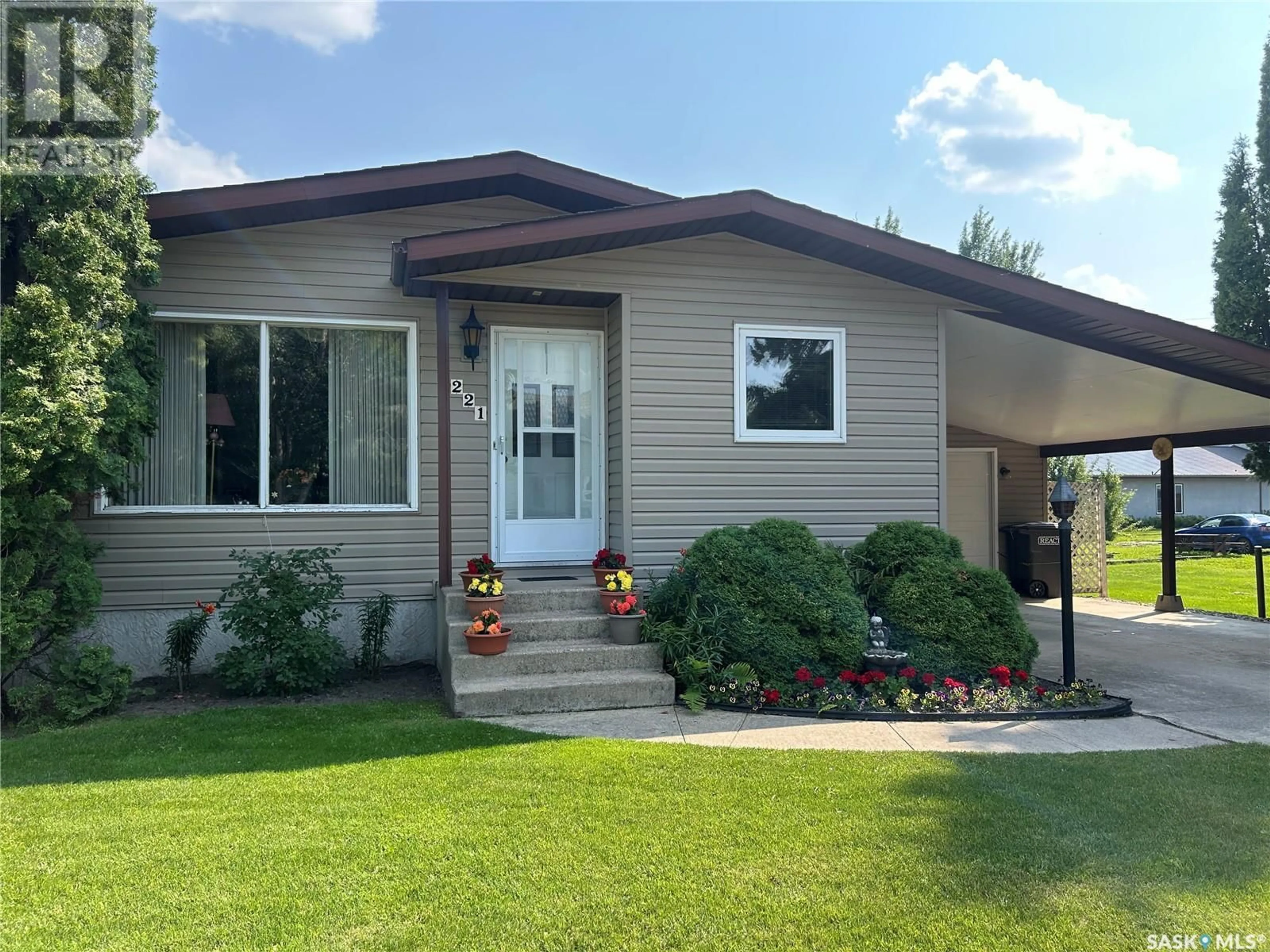 Home with vinyl exterior material, street for 221 HOWARD STREET, Drake Saskatchewan S0K1H0