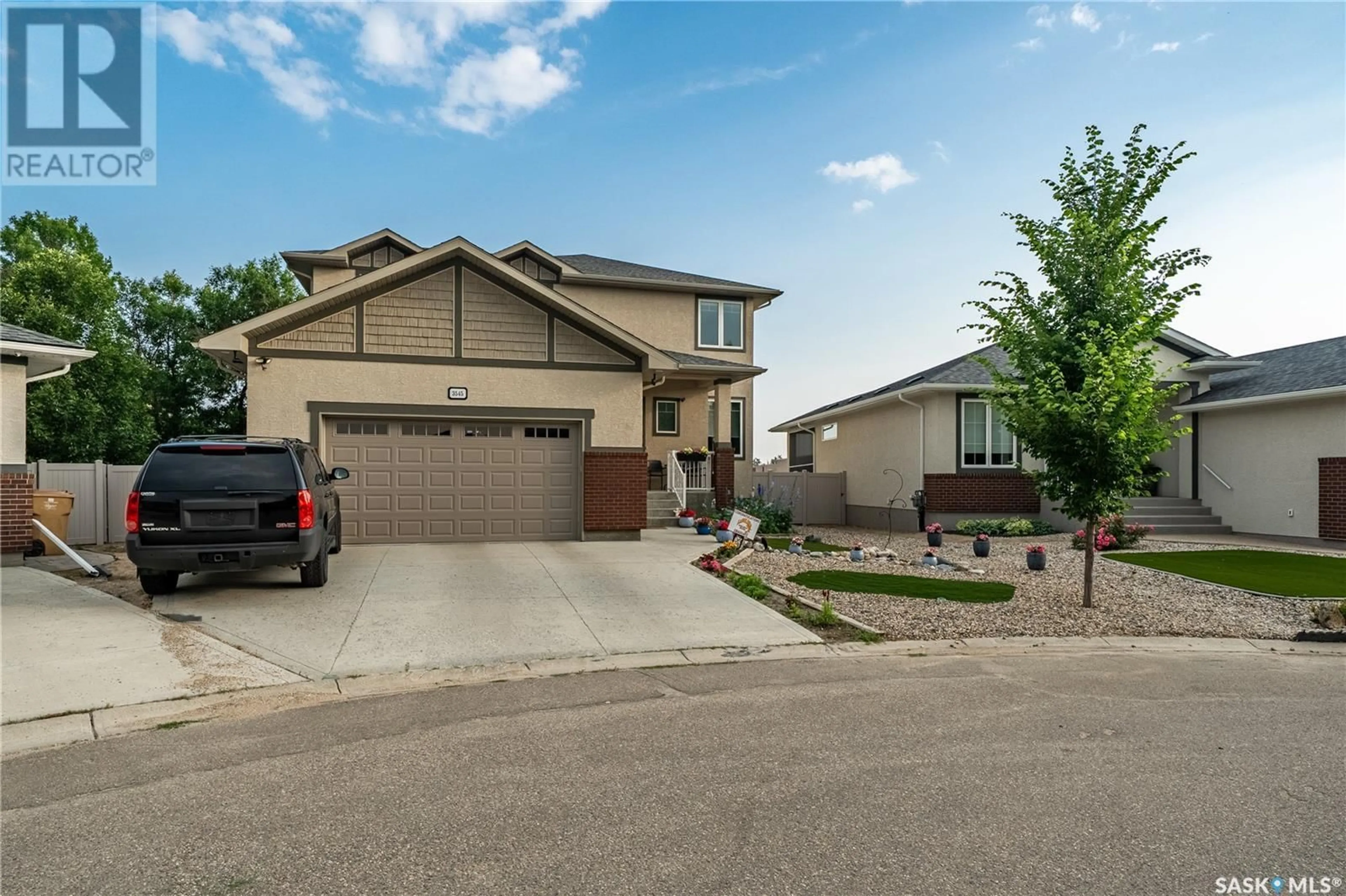 Home with vinyl exterior material, street for 3545 EVANS COURT, Regina Saskatchewan S4S0A9