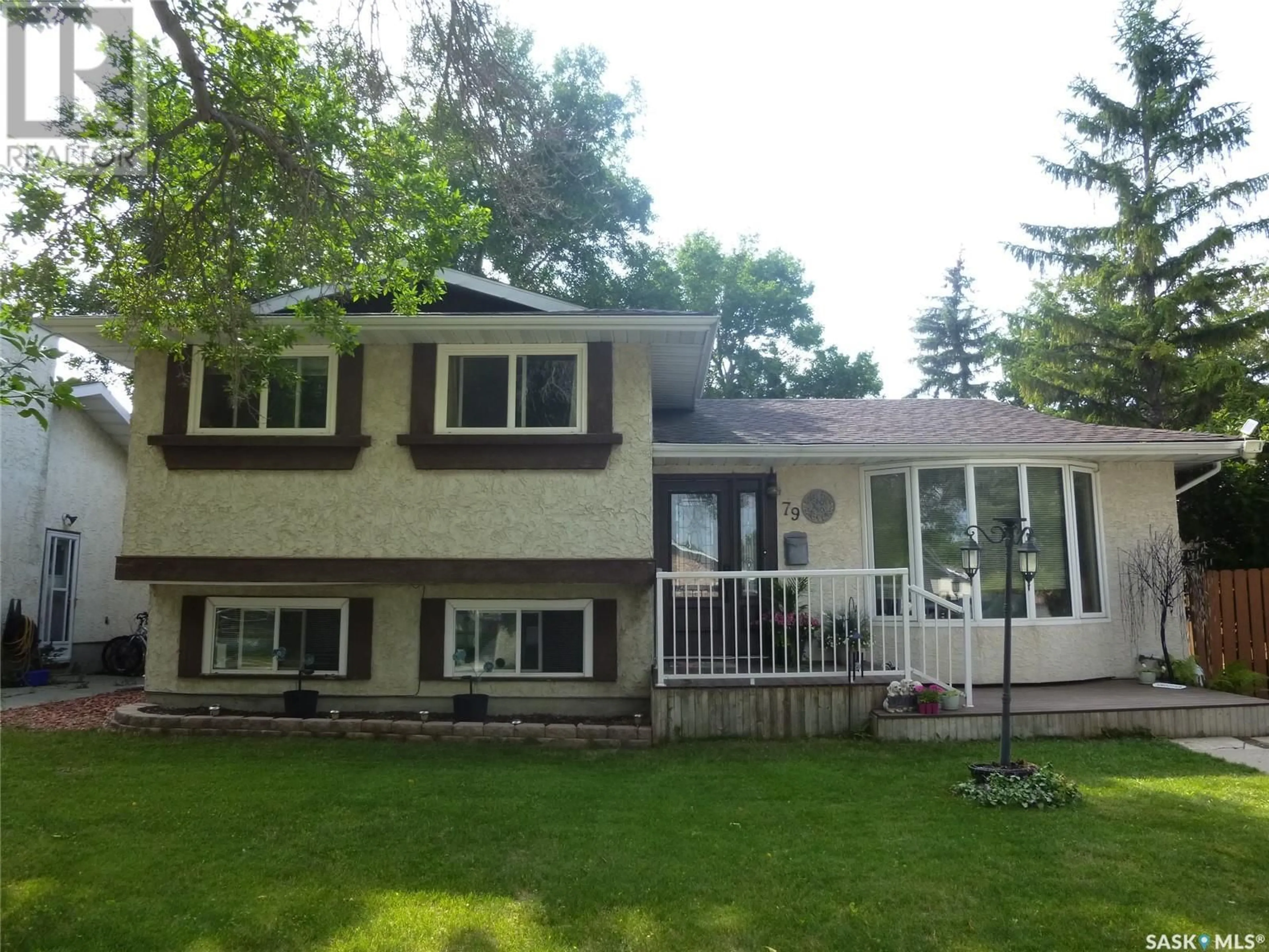 Home with vinyl exterior material, street for 79 SIBBALD CRESCENT, Regina Saskatchewan S4T7L6