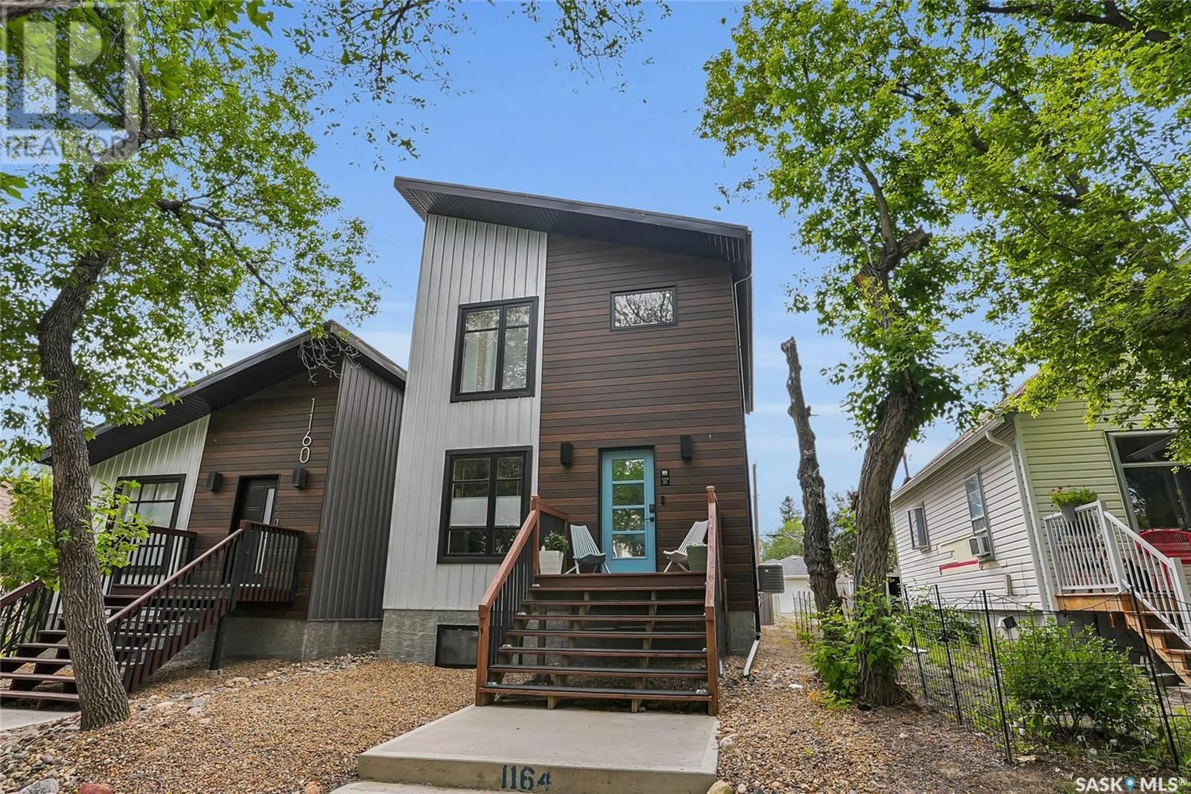 Home with vinyl exterior material, street for 1164 WILLOW AVENUE, Moose Jaw Saskatchewan S6H1G8