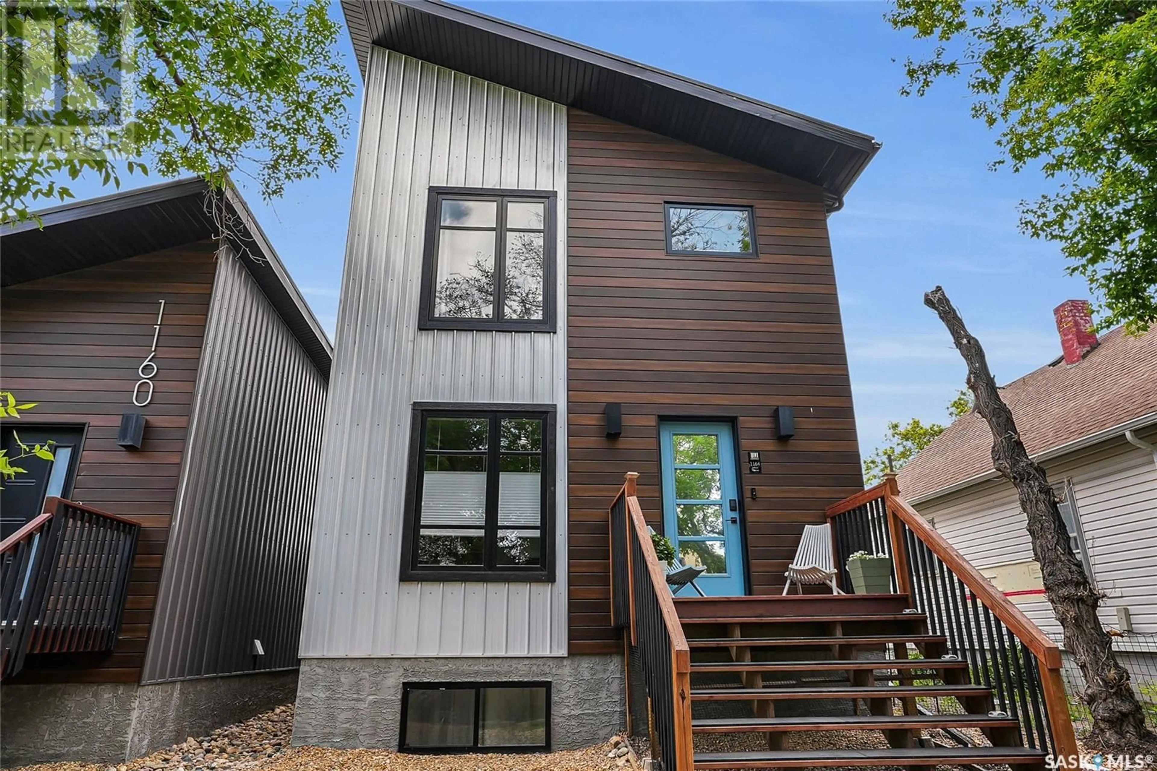 Home with vinyl exterior material, street for 1164 WILLOW AVENUE, Moose Jaw Saskatchewan S6H1G8