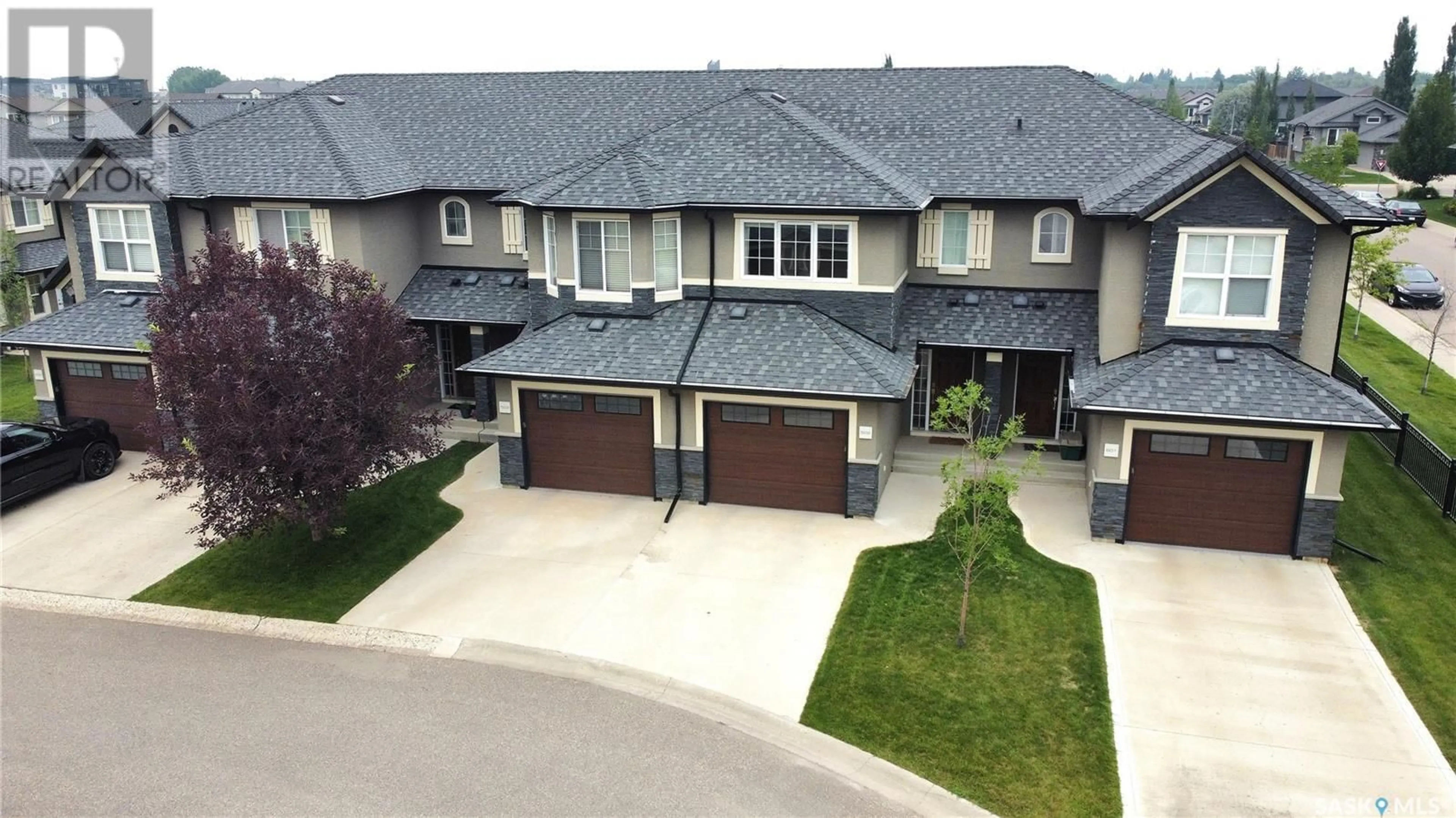 A pic from outside/outdoor area/front of a property/back of a property/a pic from drone, street for 502 455 REMPEL LANE, Saskatoon Saskatchewan S7T0R8