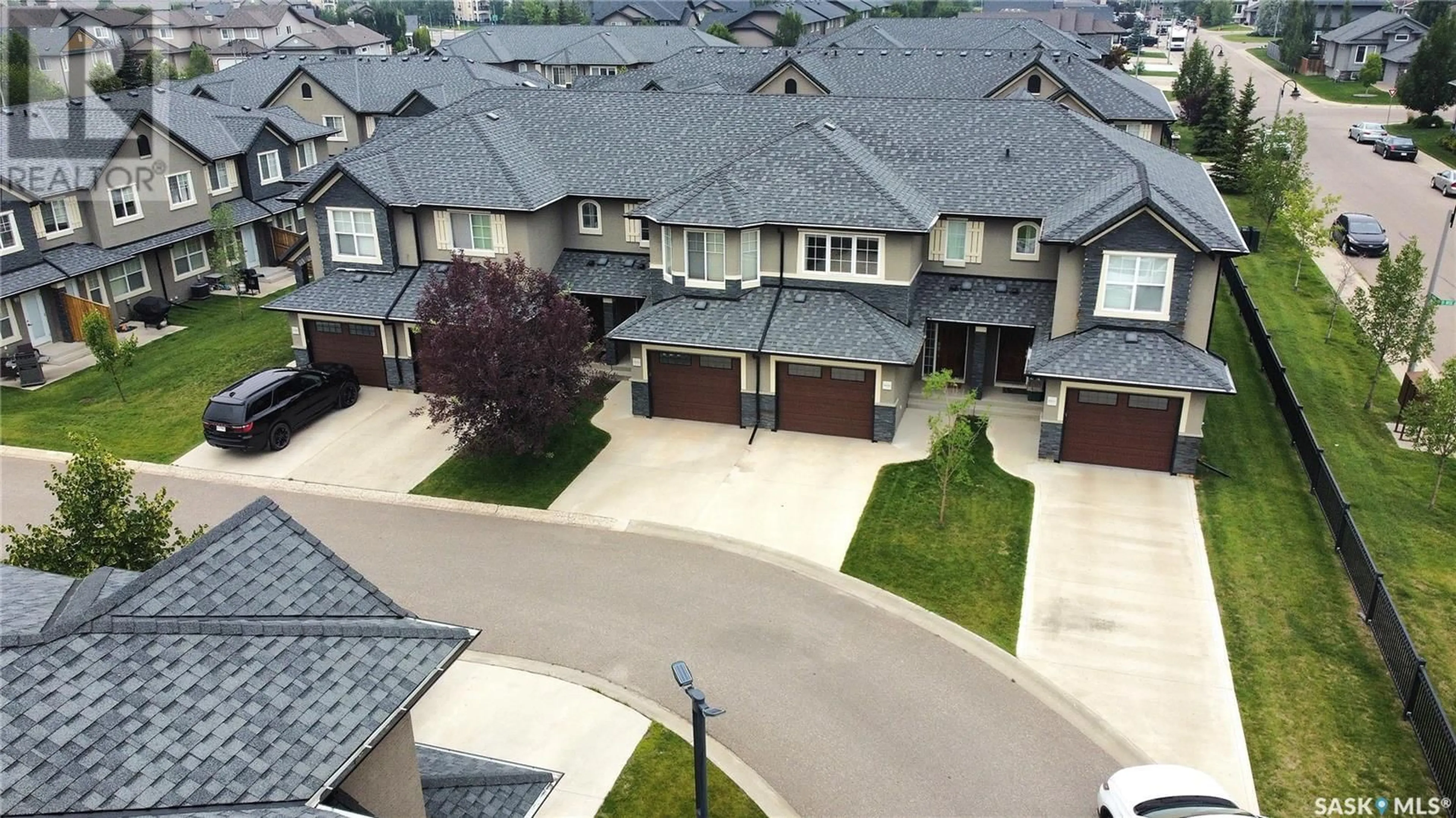 A pic from outside/outdoor area/front of a property/back of a property/a pic from drone, street for 502 455 REMPEL LANE, Saskatoon Saskatchewan S7T0R8
