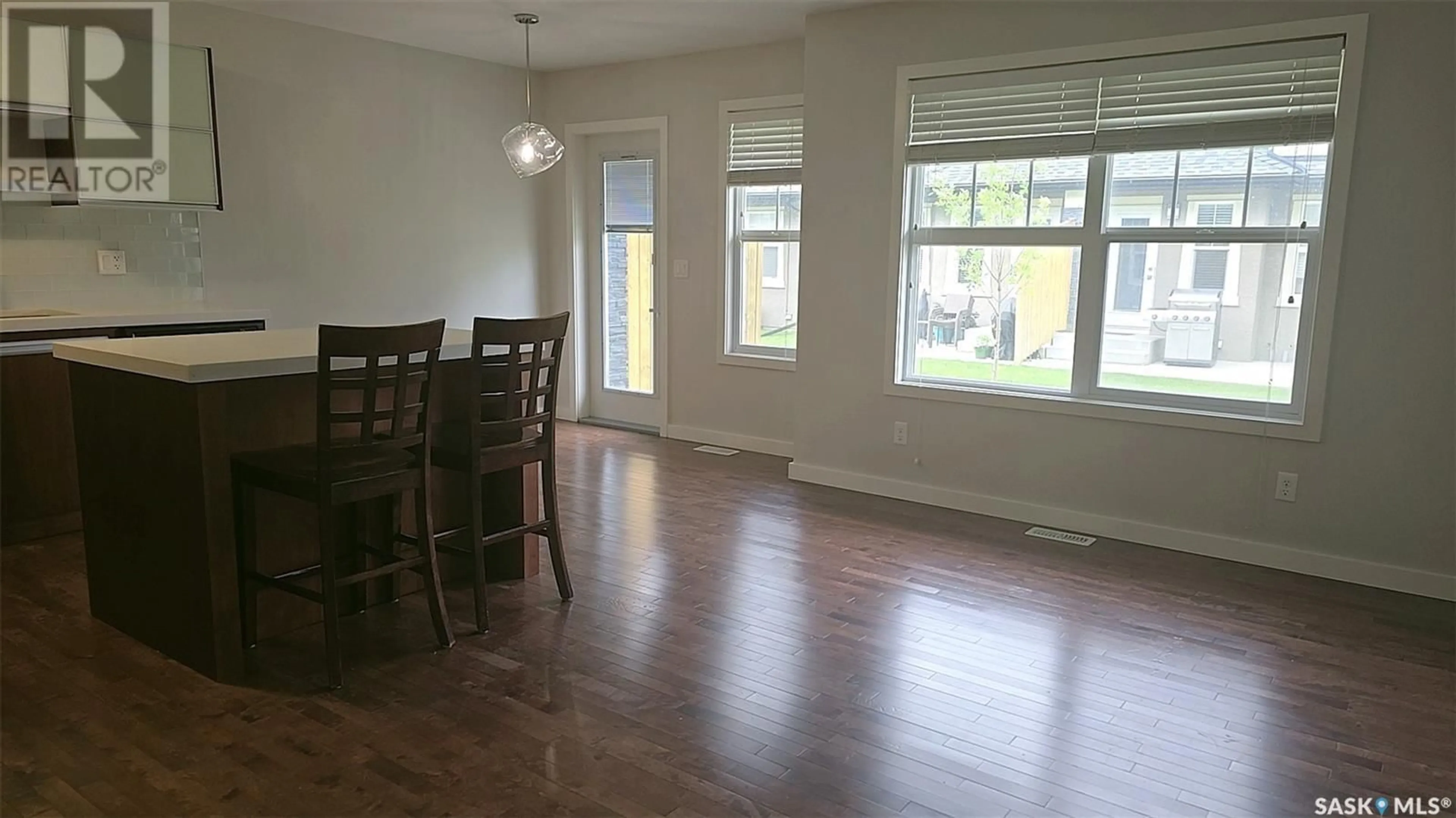 Dining room, wood/laminate floor for 502 455 REMPEL LANE, Saskatoon Saskatchewan S7T0R8