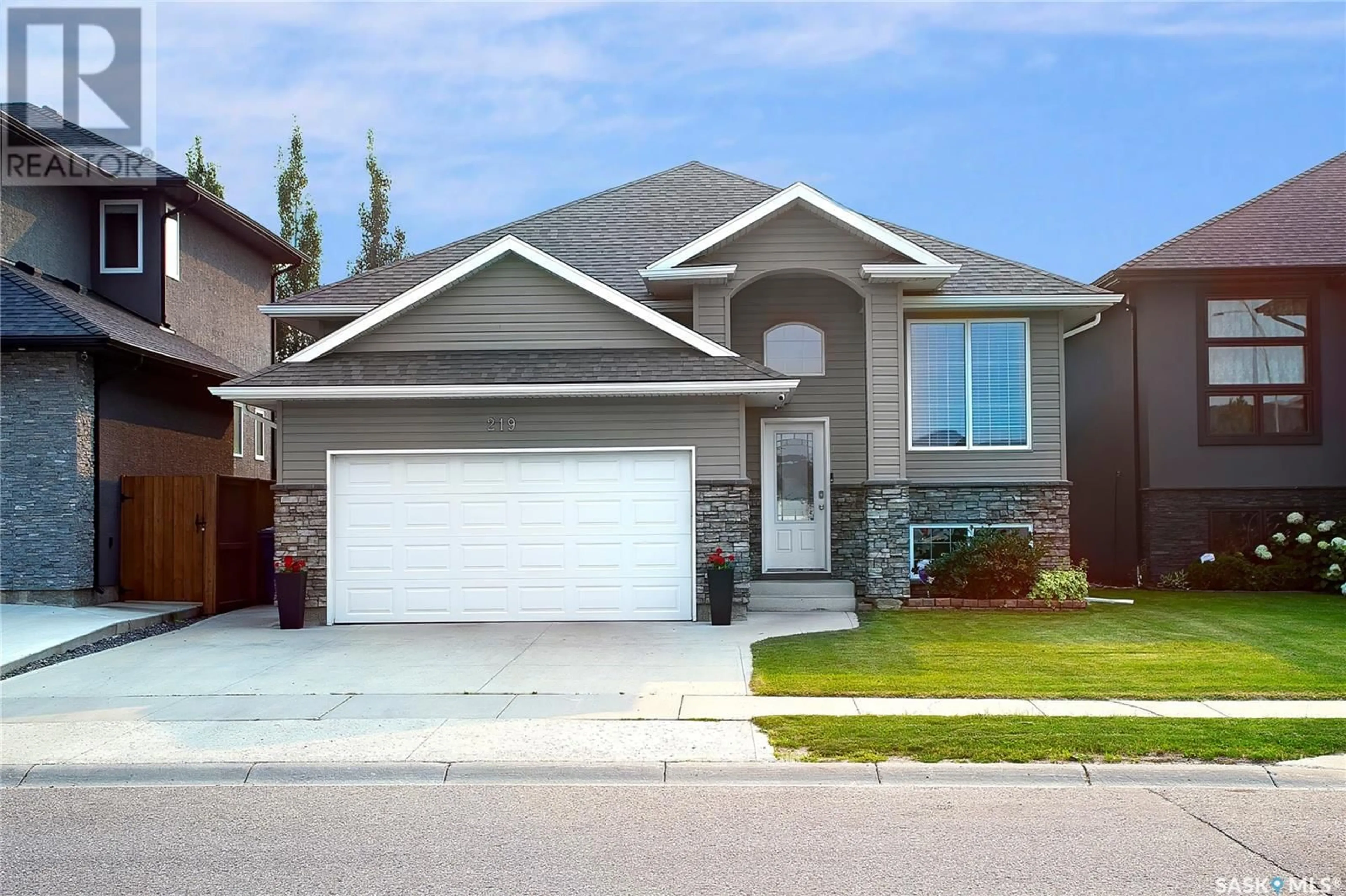 Home with vinyl exterior material, street for 219 ZARY ROAD, Saskatoon Saskatchewan S7K0K3