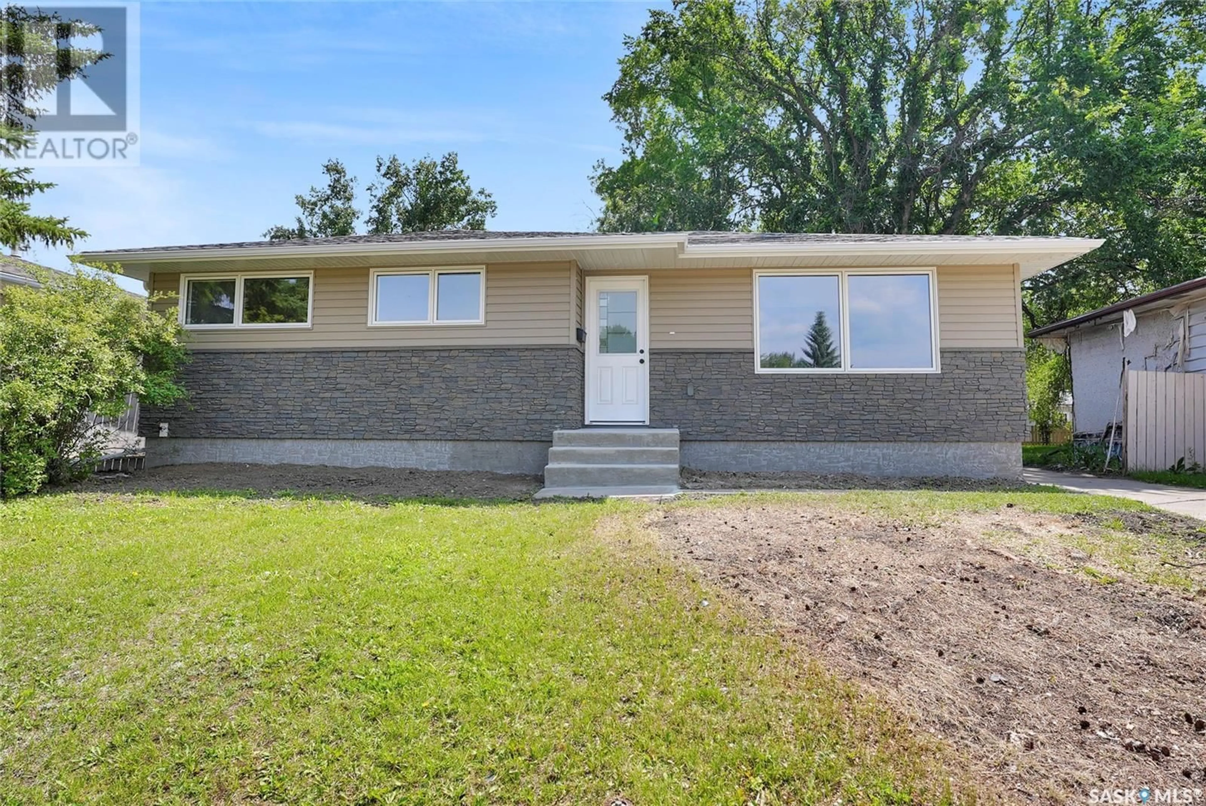 Home with brick exterior material, street for 1049 SIMCOE STREET, Moose Jaw Saskatchewan S6H3J3