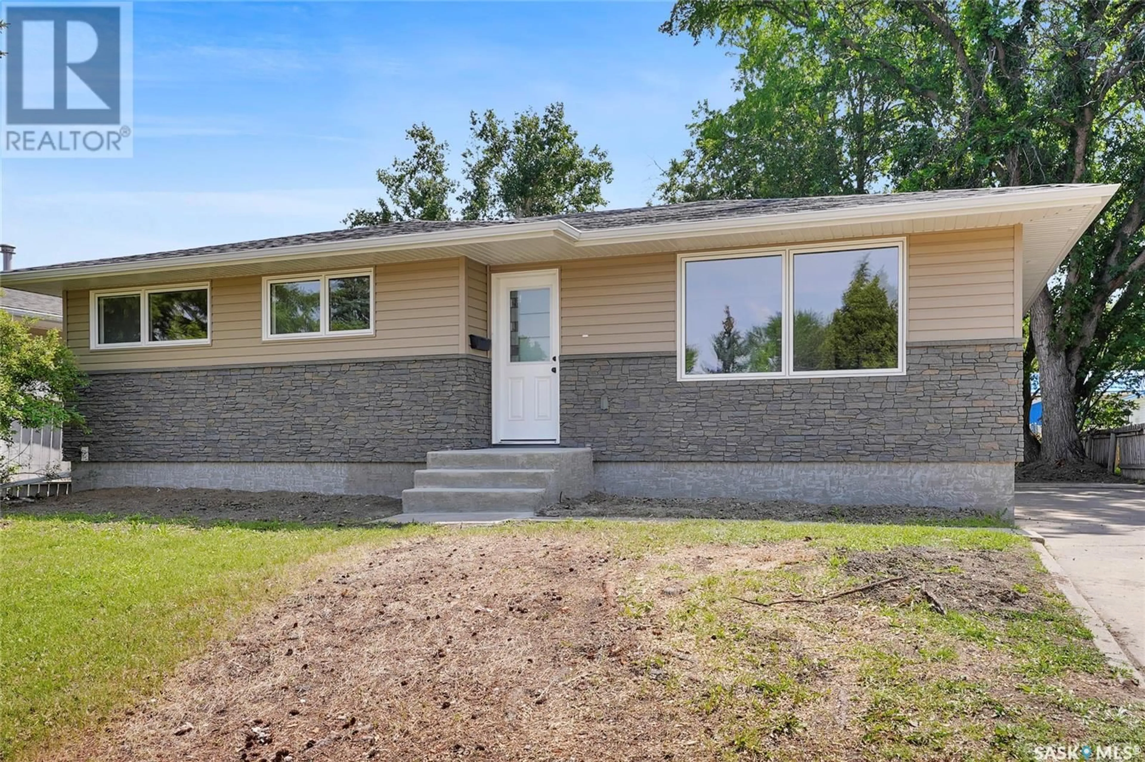 Home with brick exterior material, street for 1049 SIMCOE STREET, Moose Jaw Saskatchewan S6H3J3