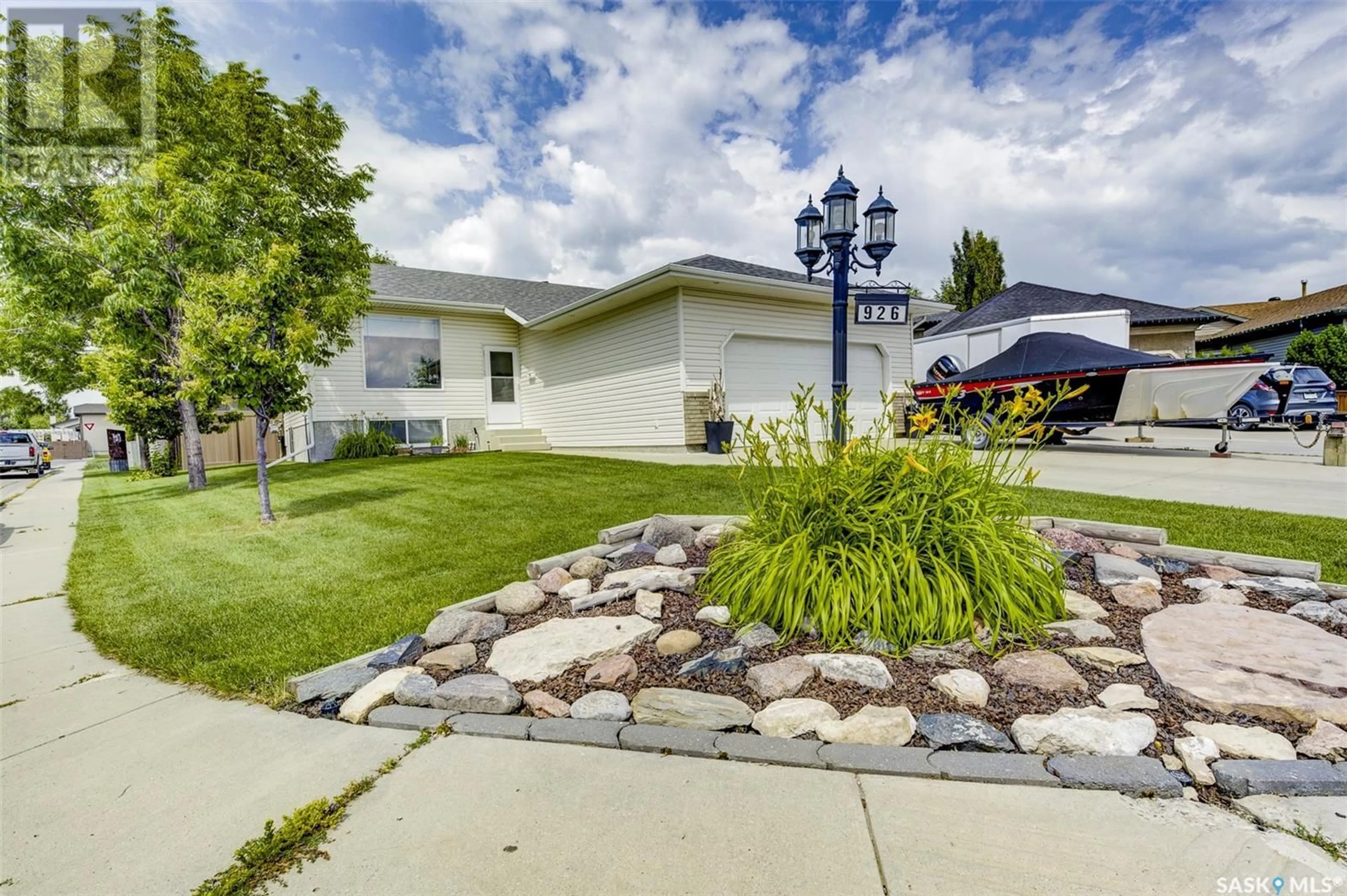 Home with vinyl exterior material, street for 926 OVERHOLT TERRACE, Saskatoon Saskatchewan S7N4S7