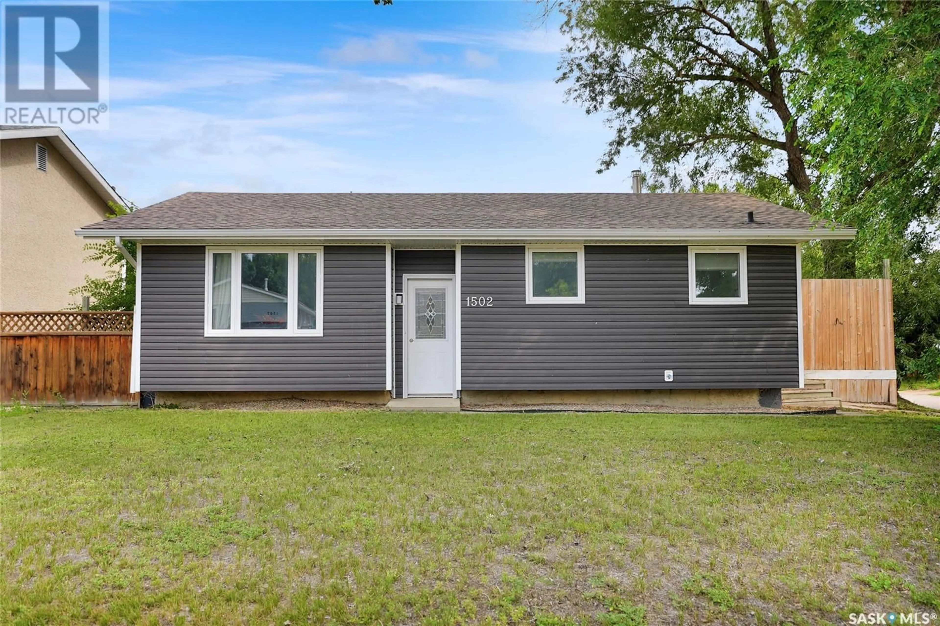 Home with vinyl exterior material, street for 1502 VAUGHAN STREET, Moose Jaw Saskatchewan S6H6S8