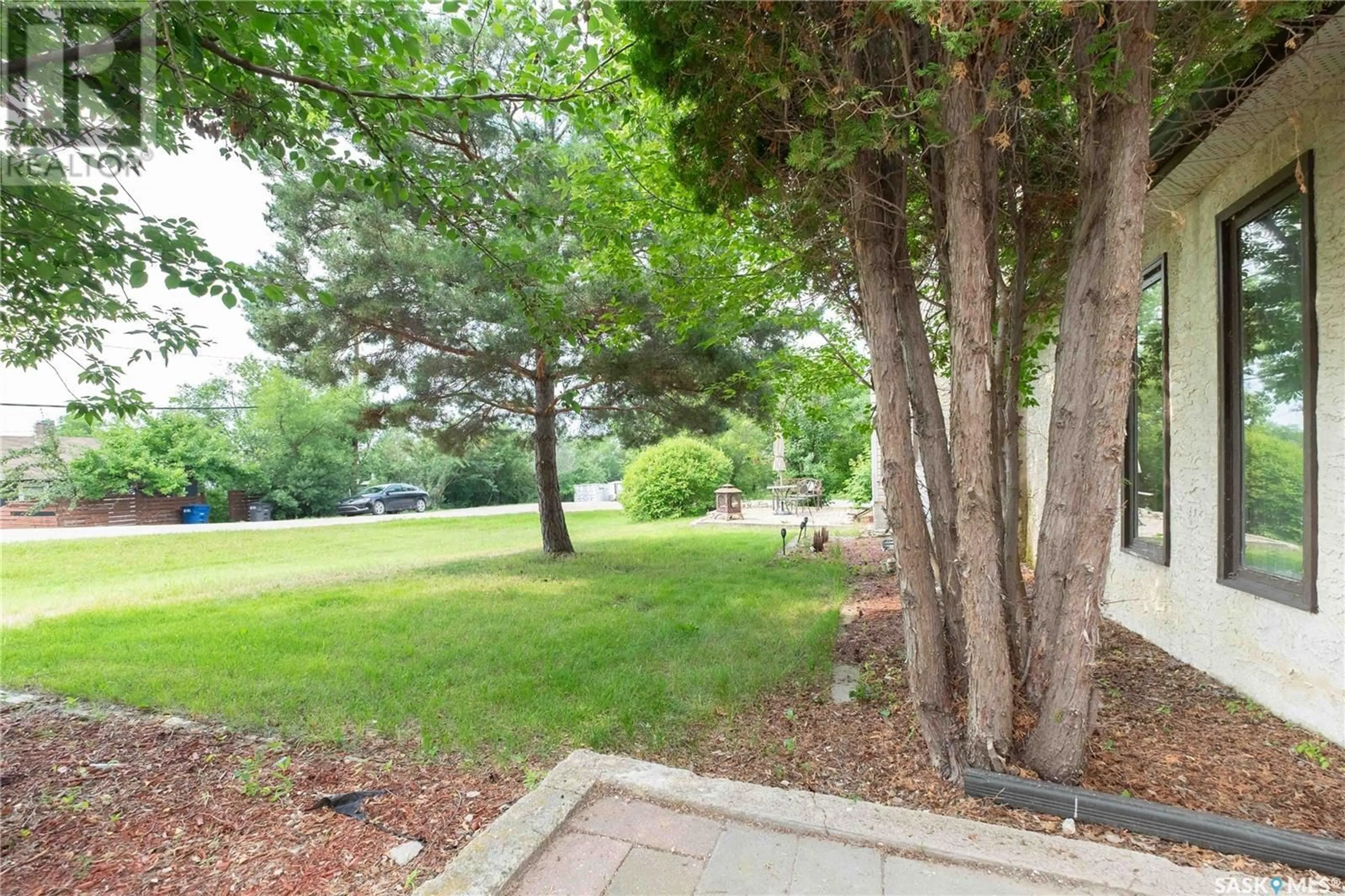 Patio, forest/trees view for 501 BANK STREET, Saskatchewan Beach Saskatchewan S0G4L0