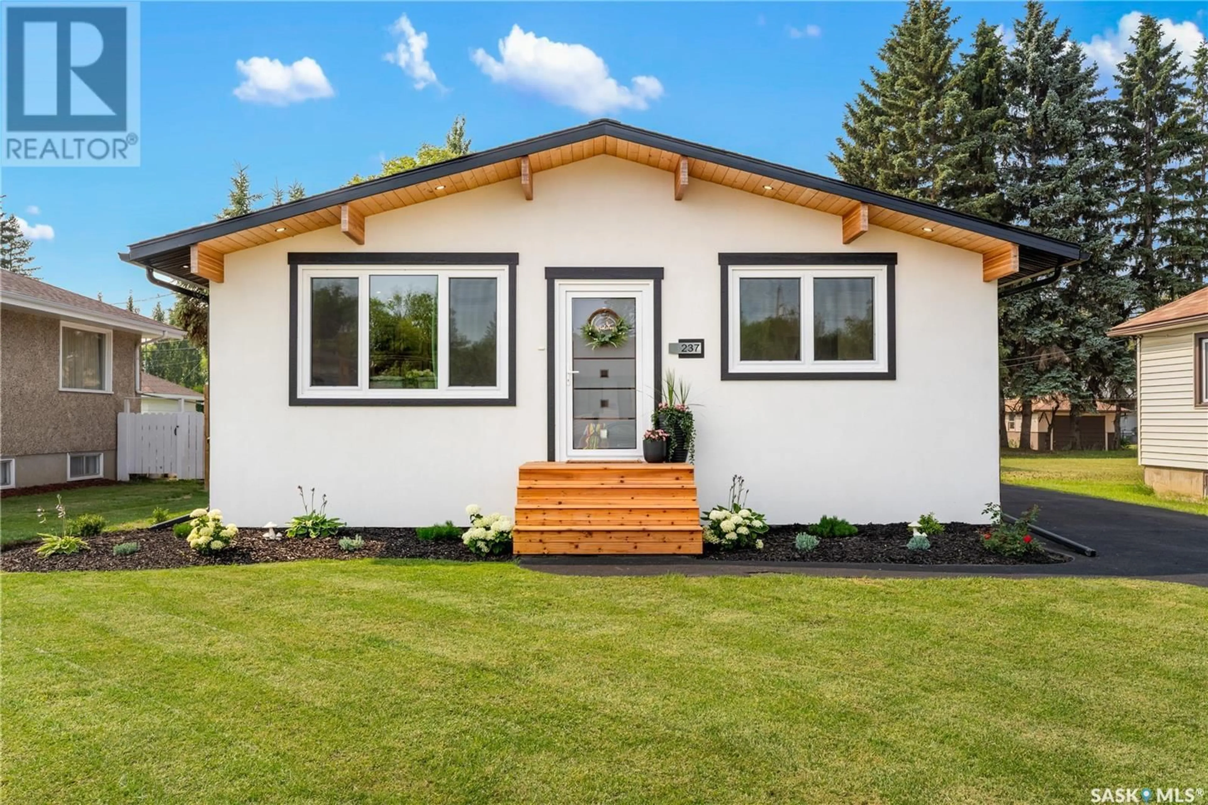 Home with vinyl exterior material, street for 237 24TH STREET, Prince Albert Saskatchewan S6V4M8