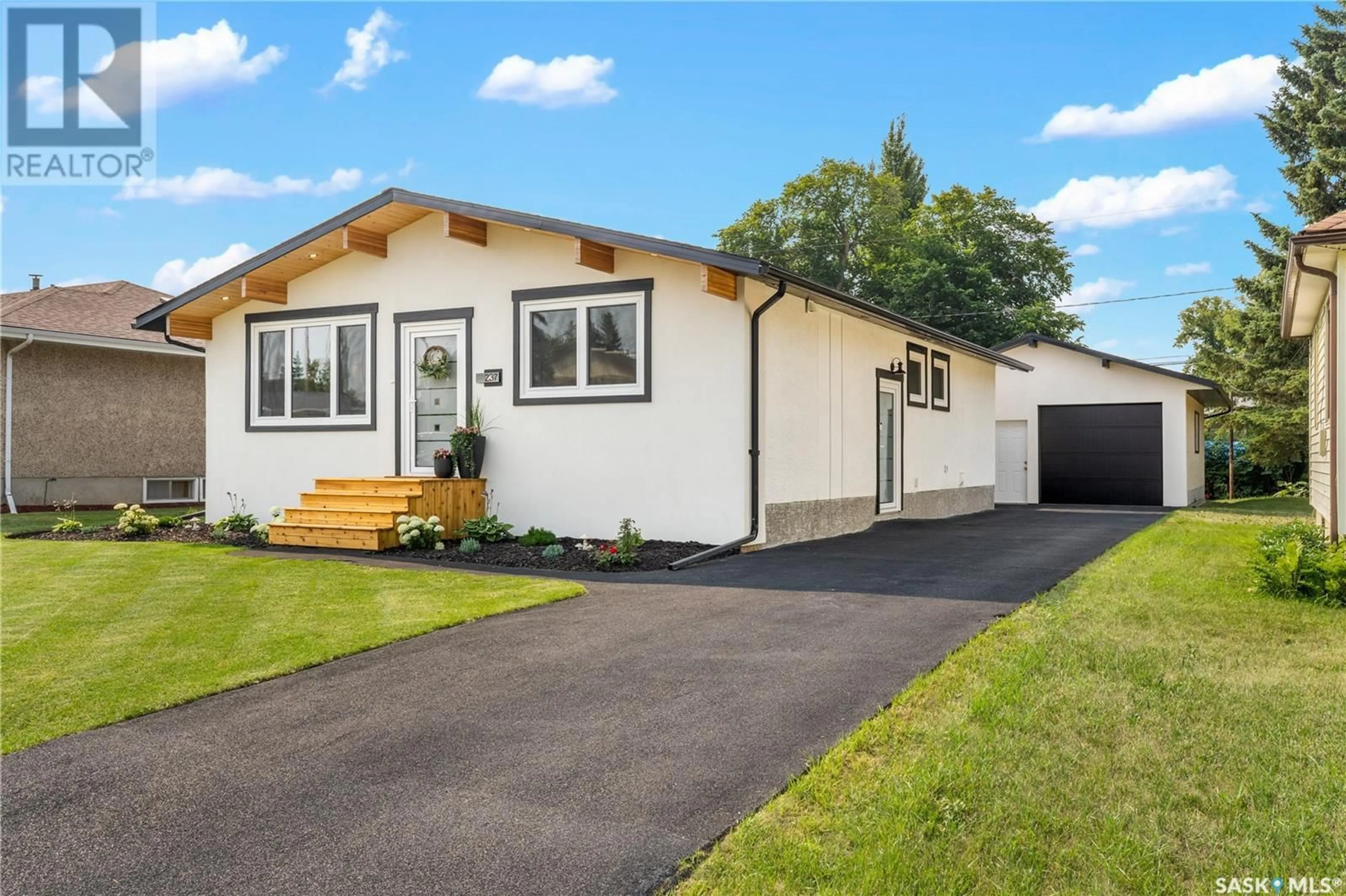 Home with vinyl exterior material, street for 237 24TH STREET, Prince Albert Saskatchewan S6V4M8
