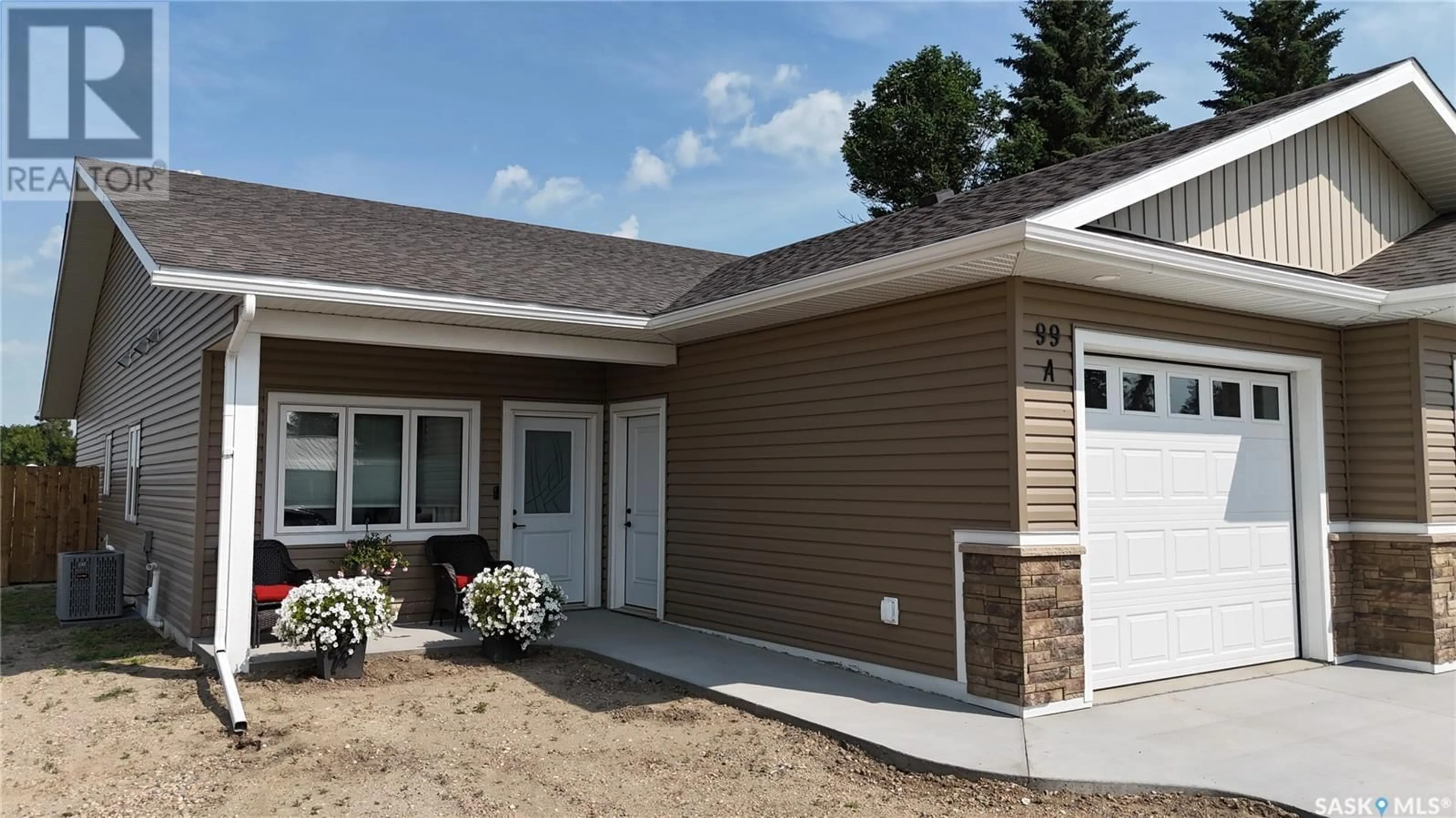 Home with vinyl exterior material, building for 99A SEMPLE STREET, Outlook Saskatchewan S0L2N0