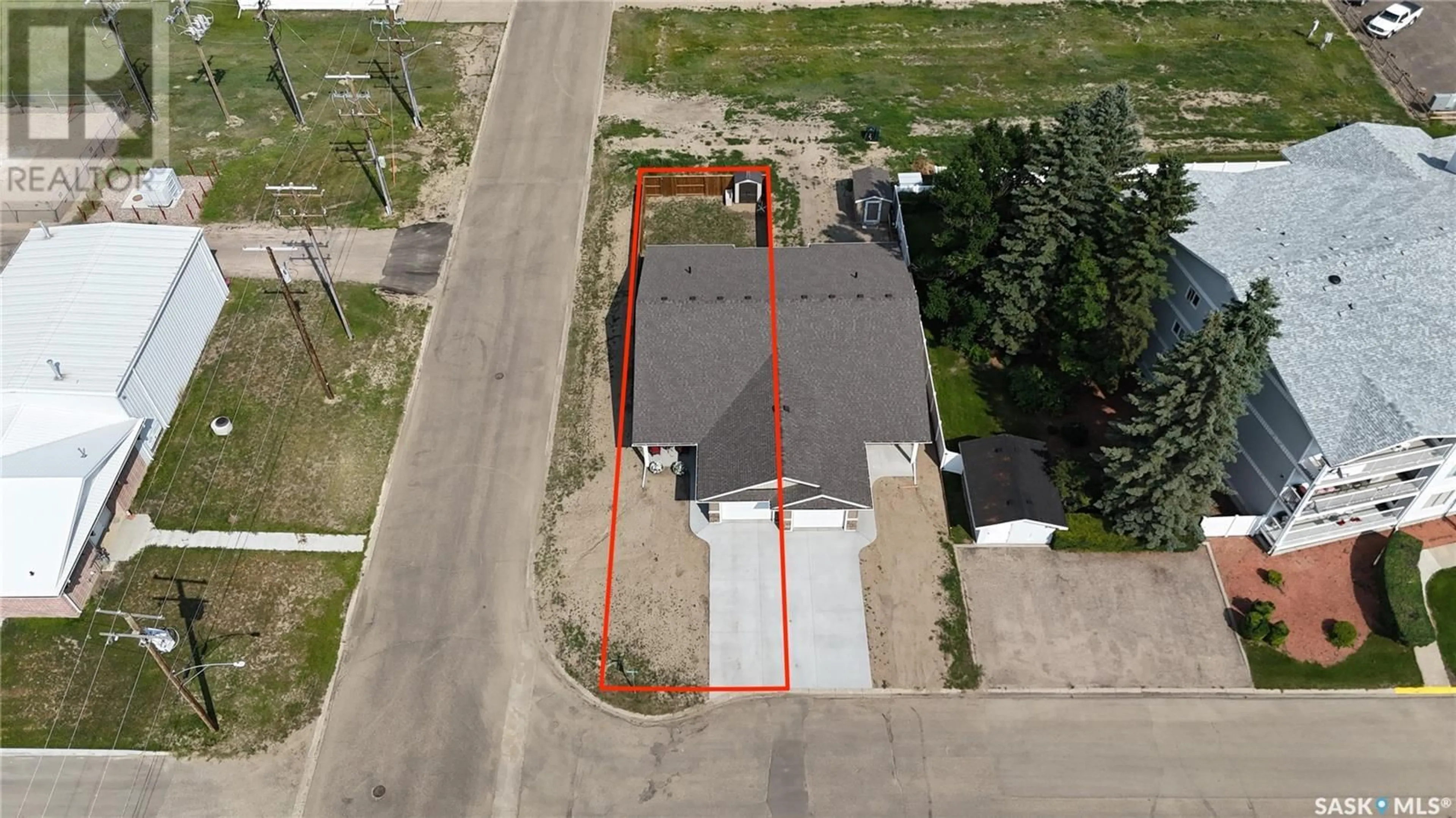 A pic from outside/outdoor area/front of a property/back of a property/a pic from drone, building for 99A SEMPLE STREET, Outlook Saskatchewan S0L2N0