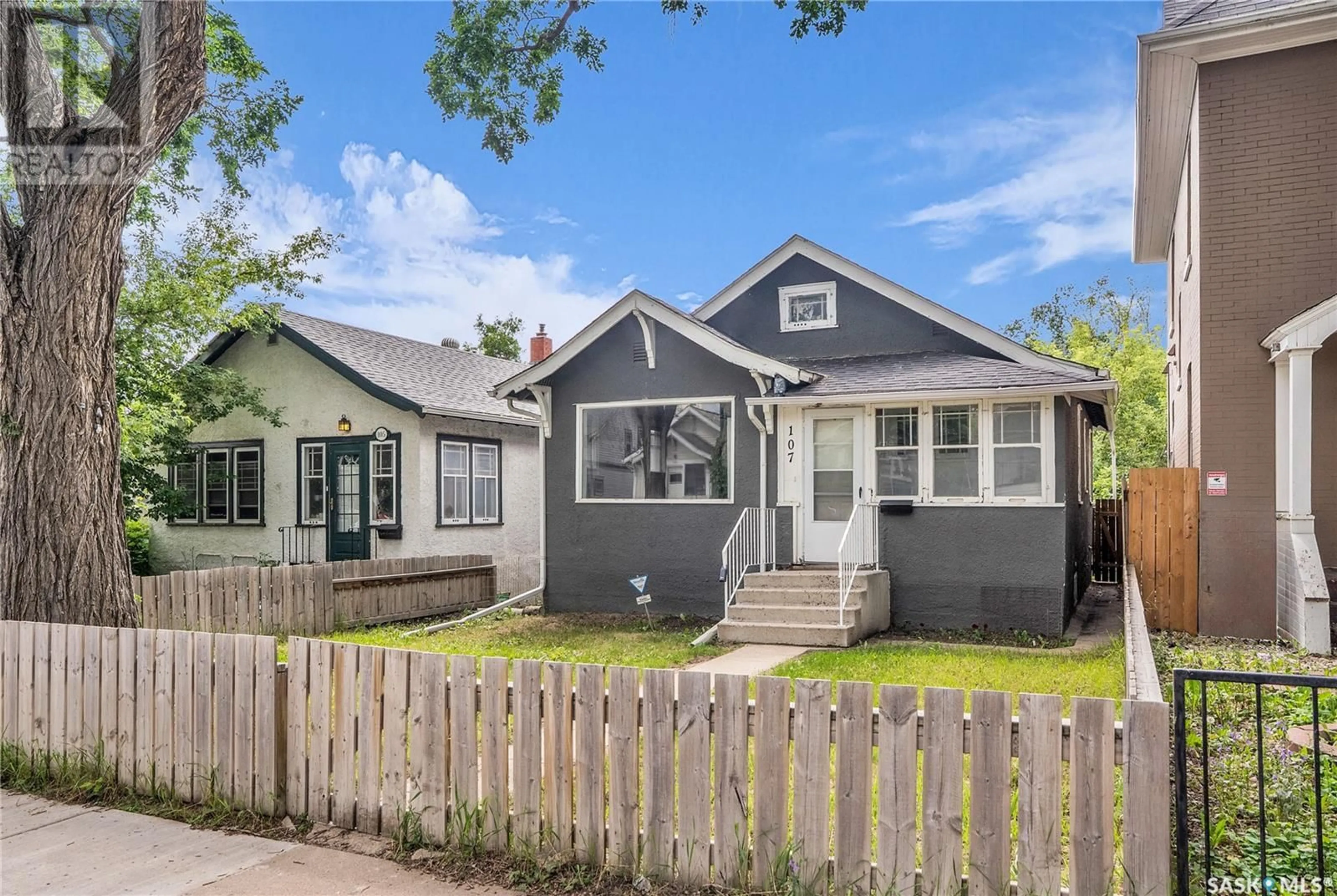 Home with vinyl exterior material, street for 107 28TH STREET, Saskatoon Saskatchewan S7L0K1