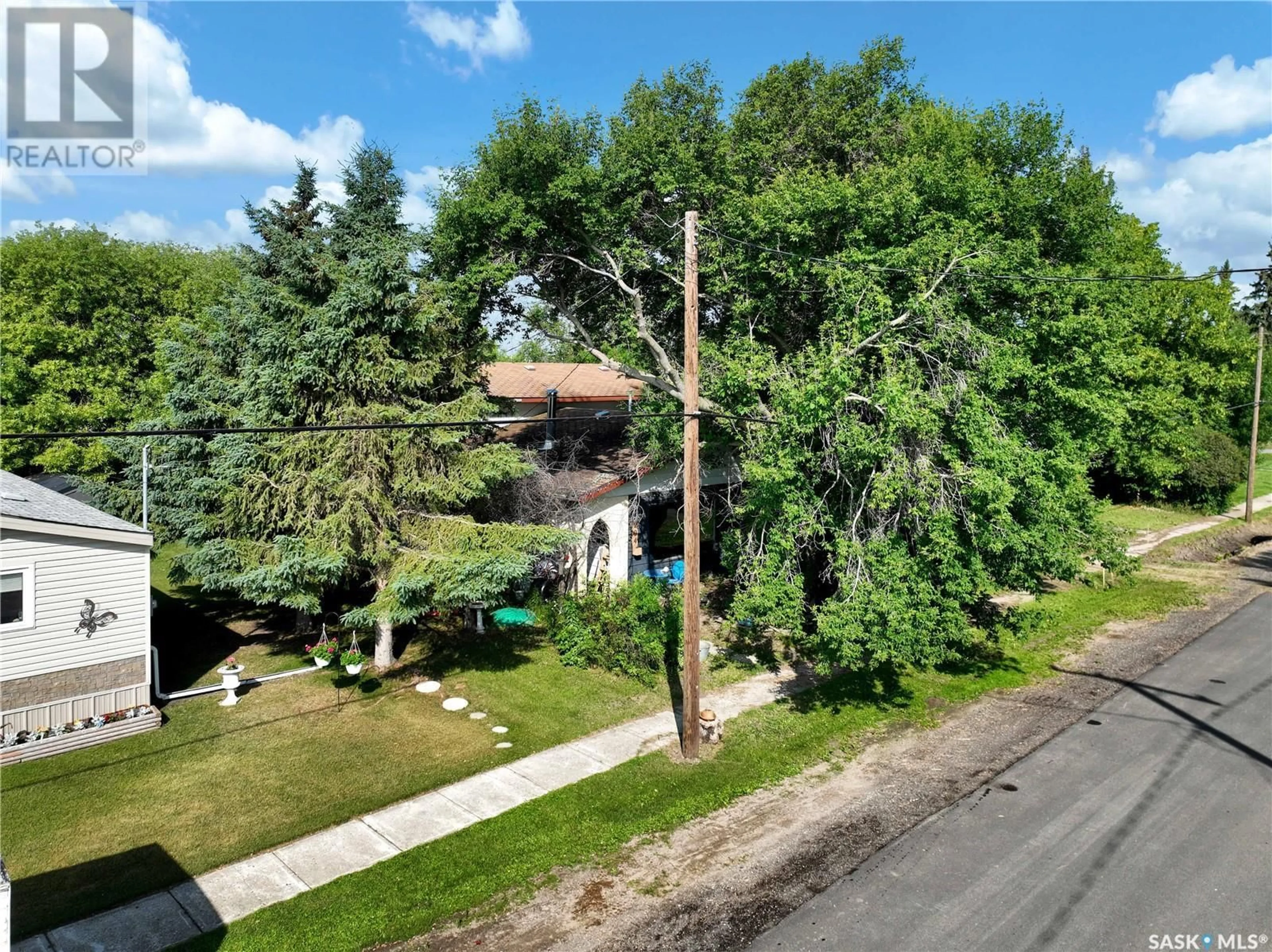 A pic from outside/outdoor area/front of a property/back of a property/a pic from drone, street for 204 ALLAN AVENUE, Saltcoats Saskatchewan S0A3R0