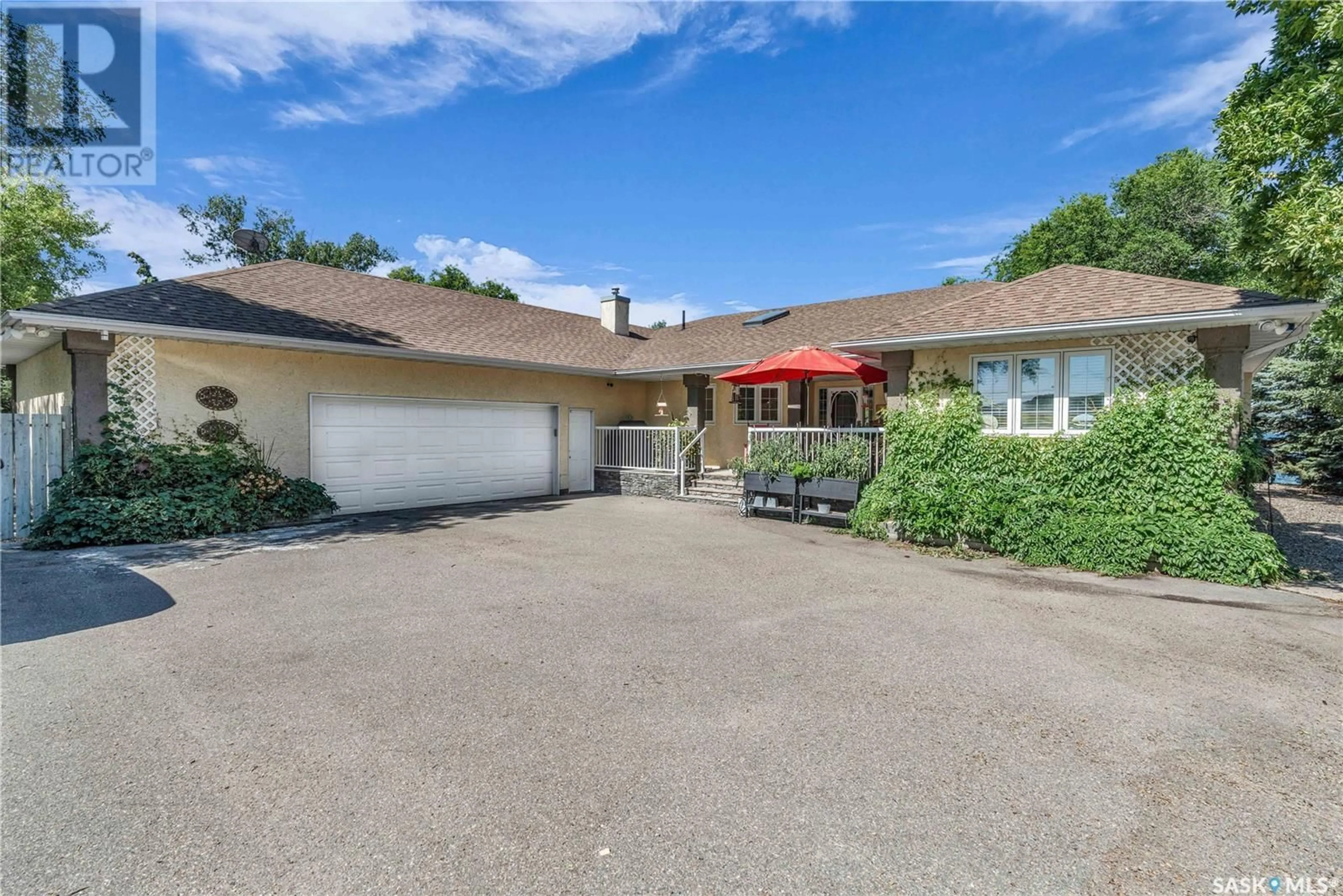A pic from outside/outdoor area/front of a property/back of a property/a pic from drone, street for 430 POPLAR DRIVE, Katepwa Beach Saskatchewan S0G2K0