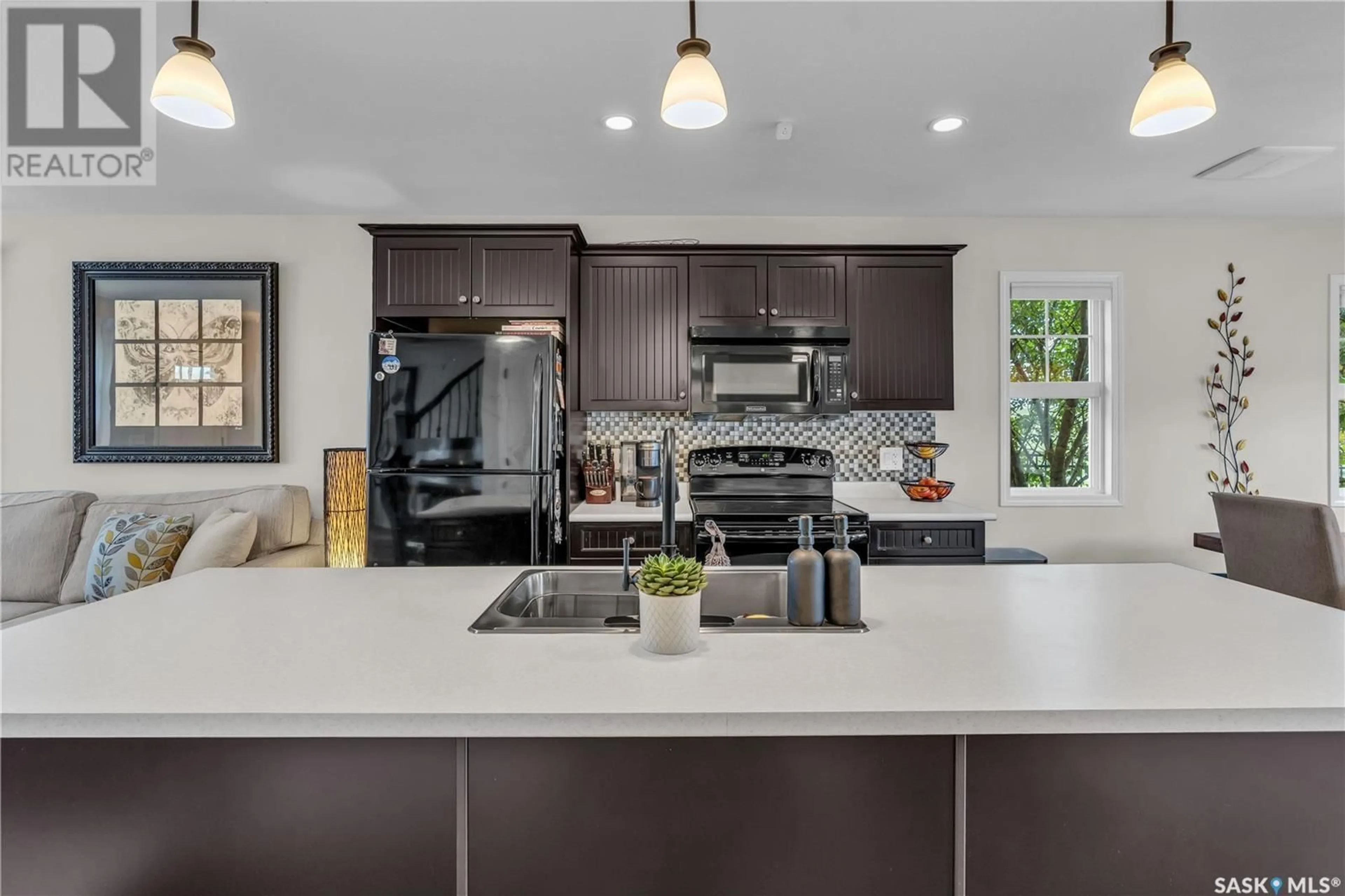 Open concept kitchen, ceramic/tile floor for 226 LANGLOIS WAY, Saskatoon Saskatchewan S7T0L2