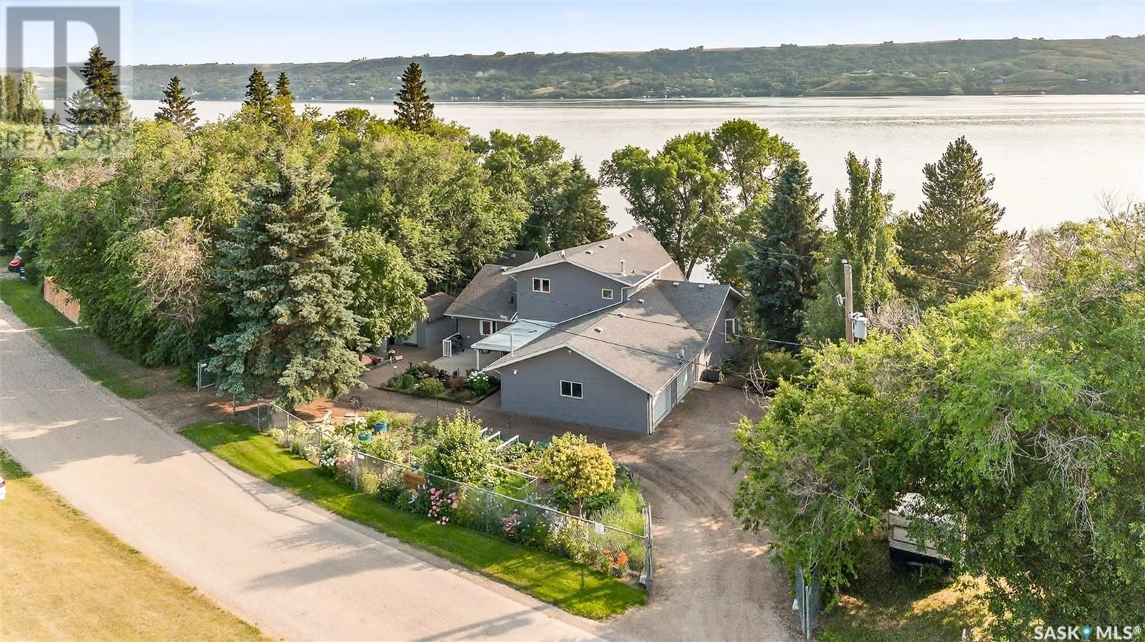 A pic from outside/outdoor area/front of a property/back of a property/a pic from drone, water/lake/river/ocean view for 417 DANIEL DRIVE, North Grove Saskatchewan S6H4P4