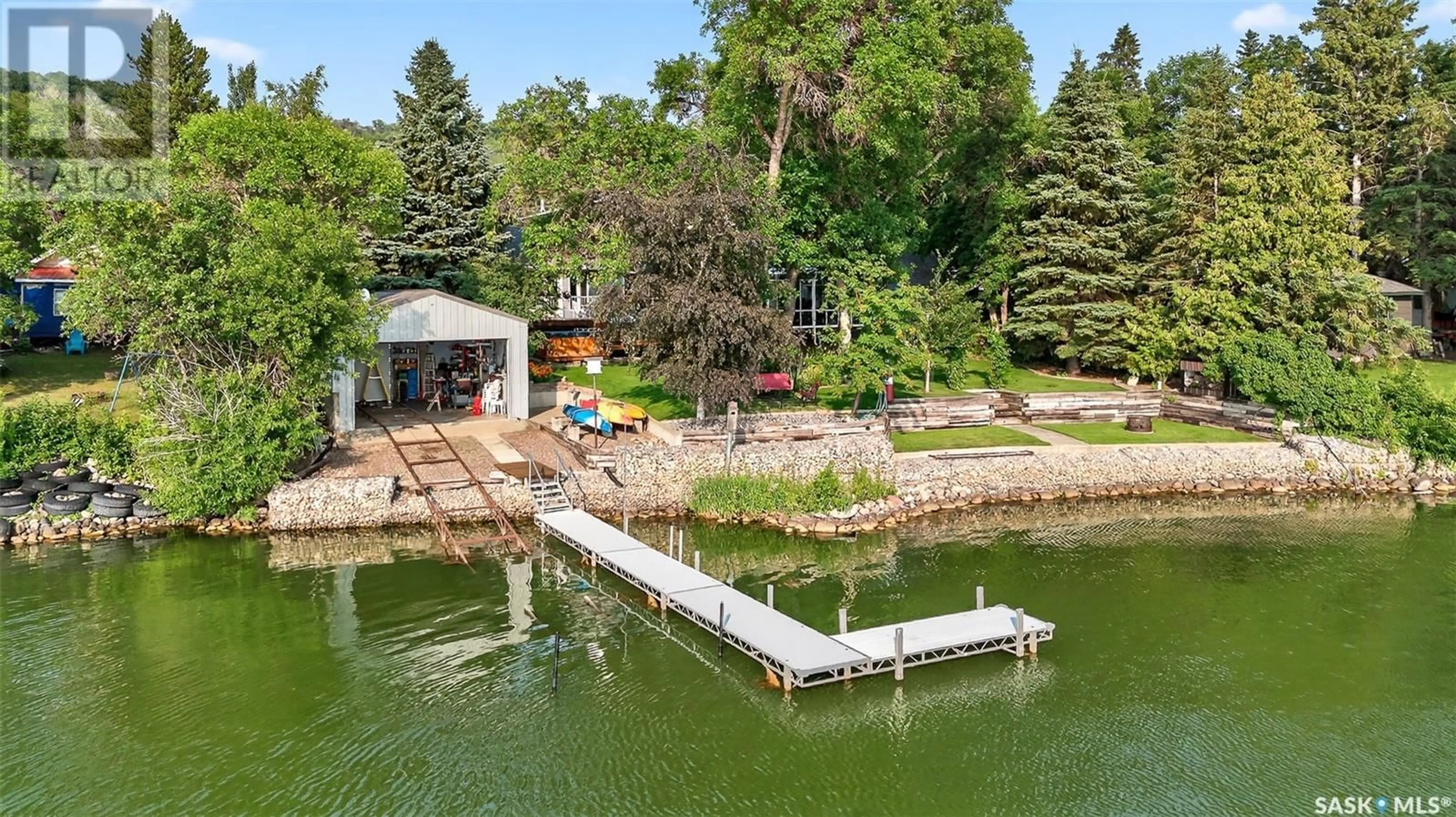 A pic from outside/outdoor area/front of a property/back of a property/a pic from drone, water/lake/river/ocean view for 417 DANIEL DRIVE, North Grove Saskatchewan S6H4P4