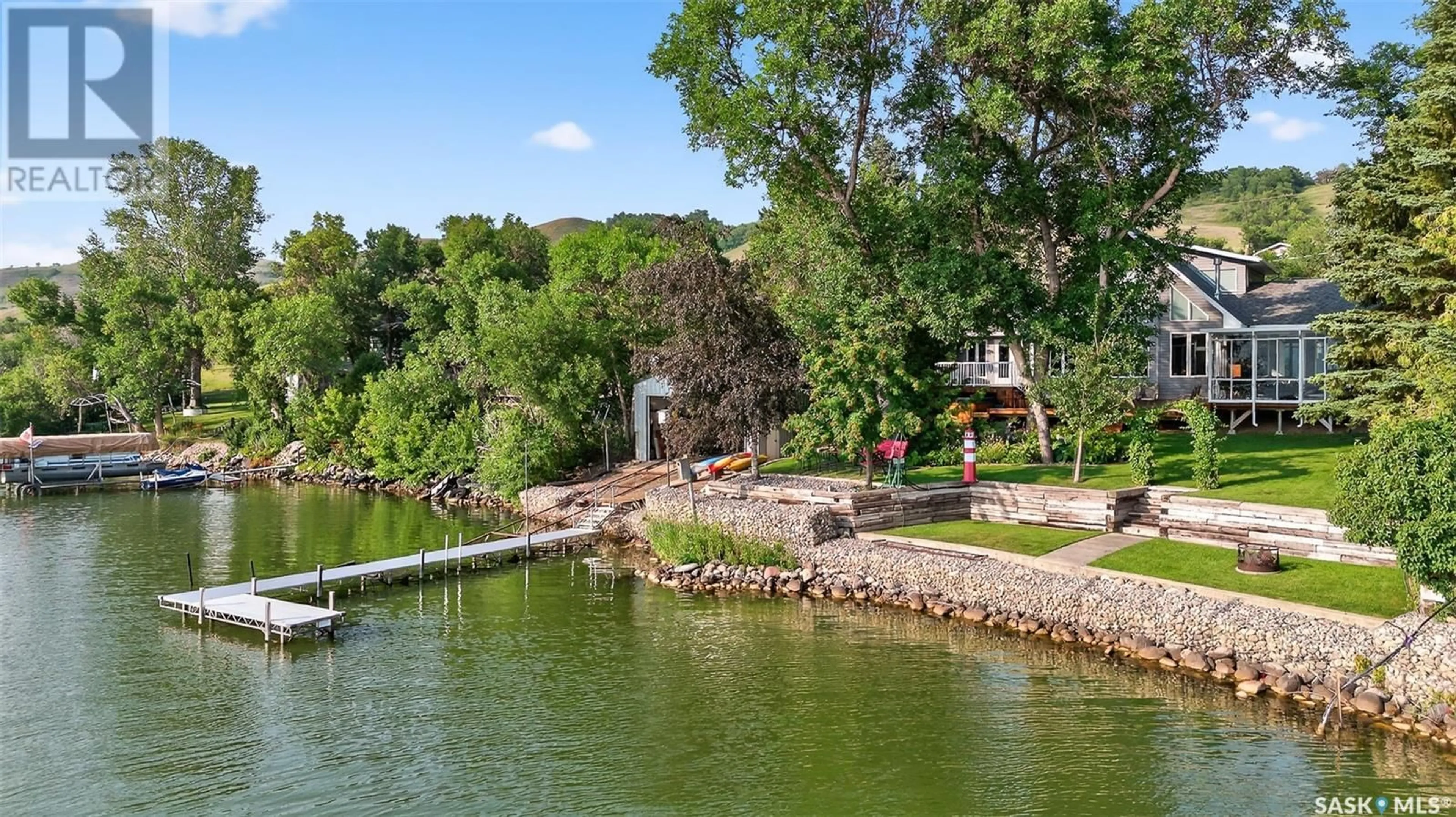 A pic from outside/outdoor area/front of a property/back of a property/a pic from drone, water/lake/river/ocean view for 417 DANIEL DRIVE, North Grove Saskatchewan S6H4P4