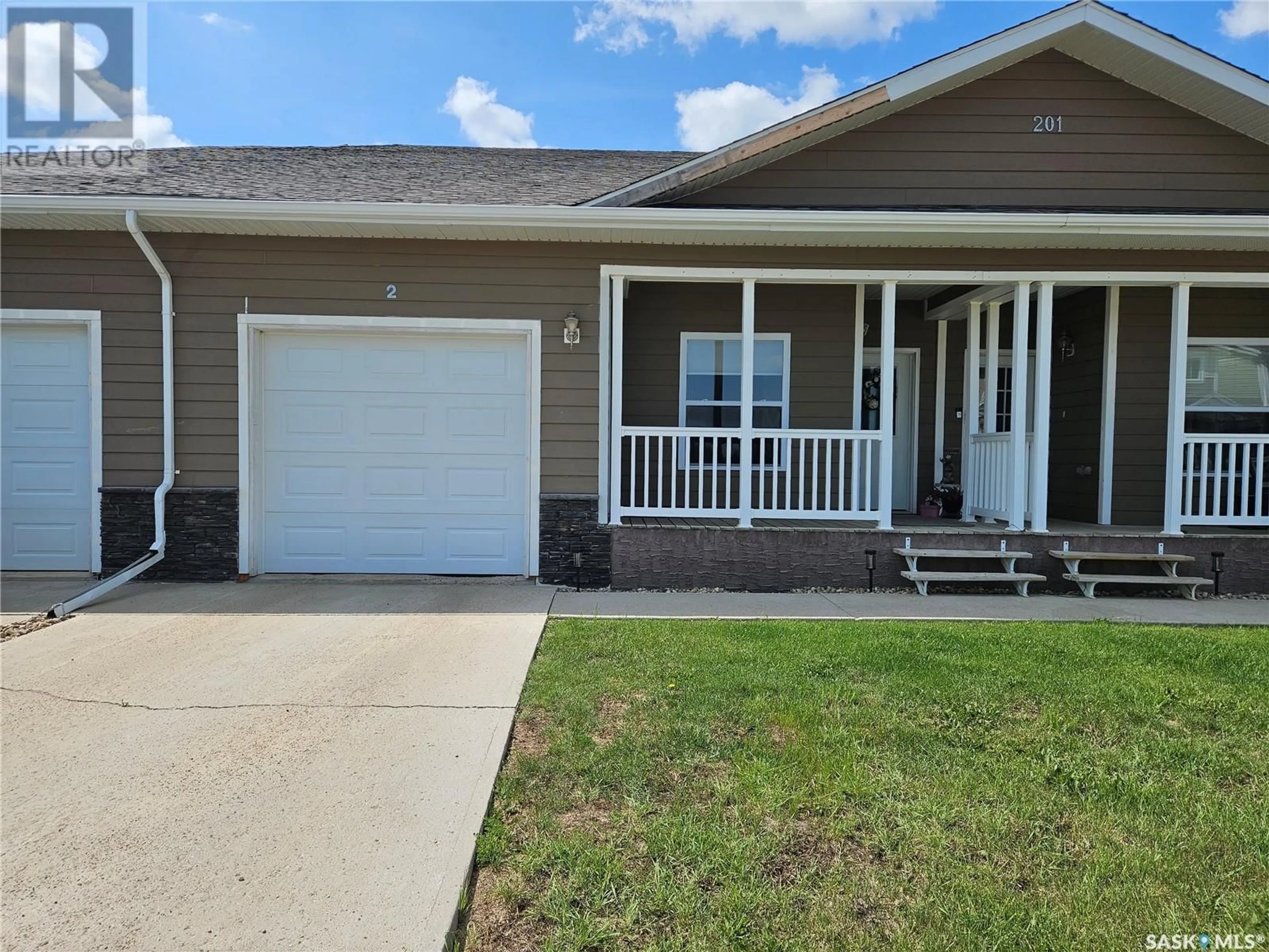 Home with vinyl exterior material, street for 2 201 RUCKLE ROAD, Carlyle Saskatchewan S0C0R0