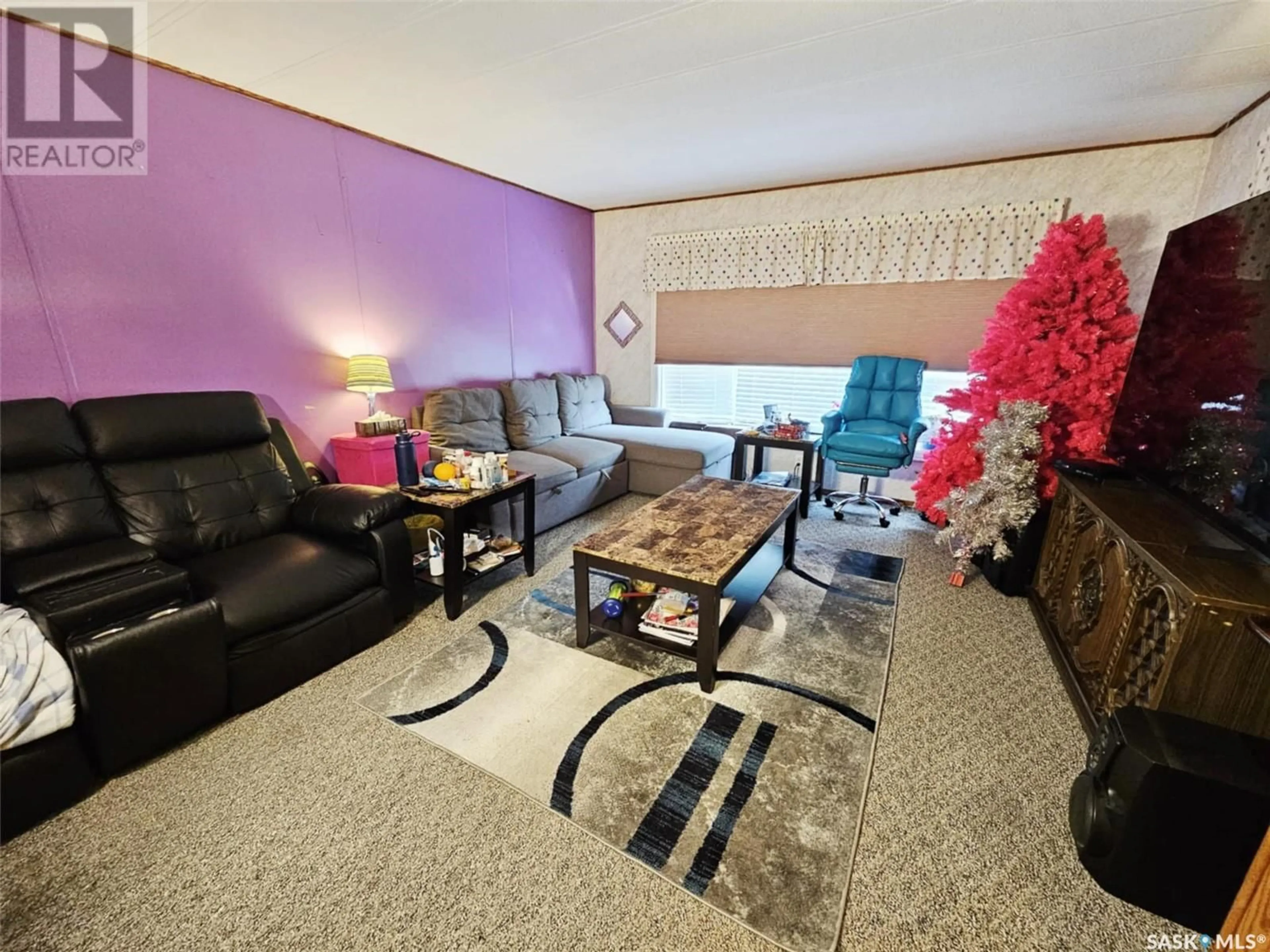 Living room with furniture, unknown for 702 FIFTH AVENUE, Melville Saskatchewan S0A2P0