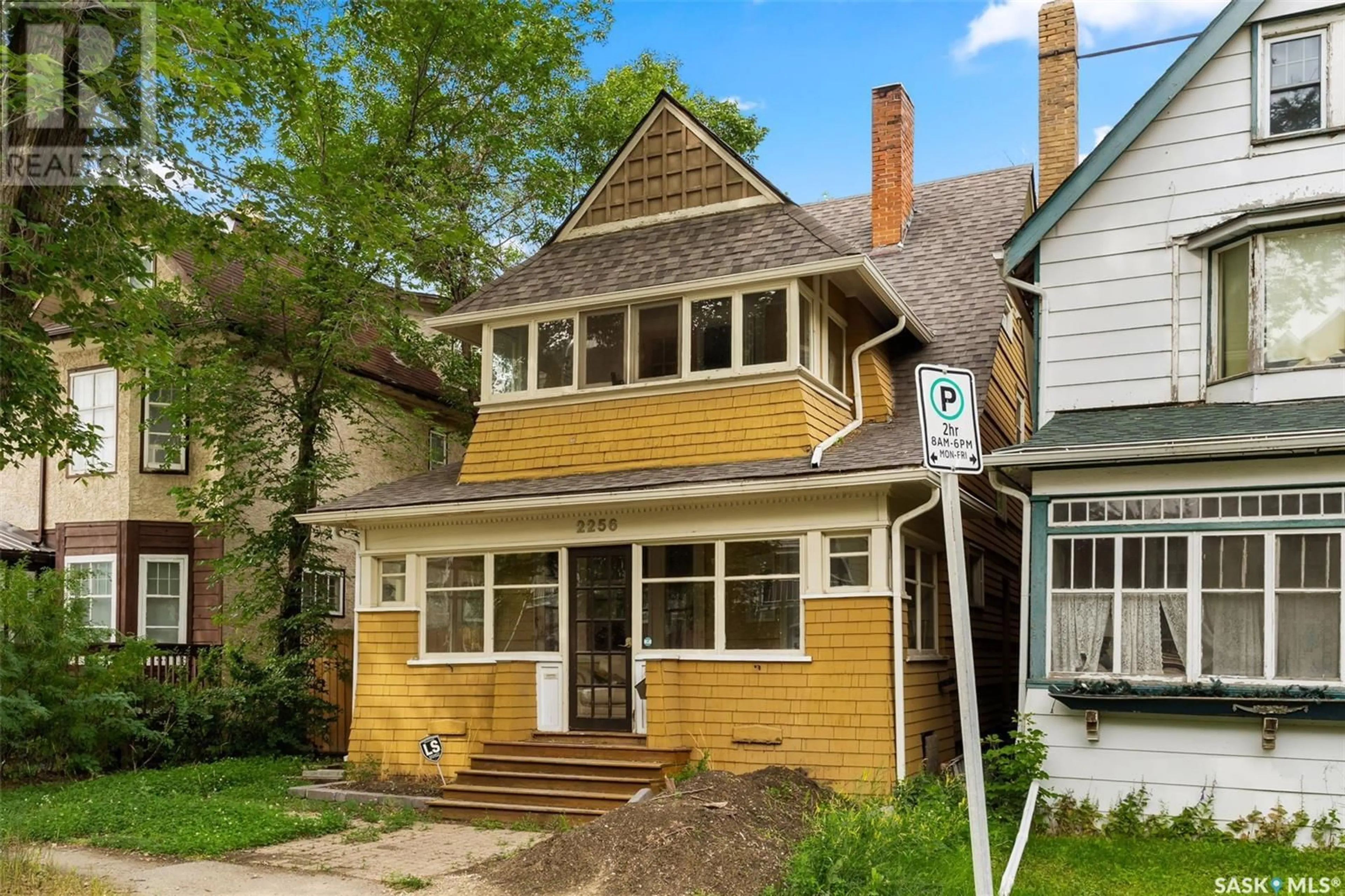 Home with vinyl exterior material, street for 2256 ANGUS STREET, Regina Saskatchewan S4T2A2