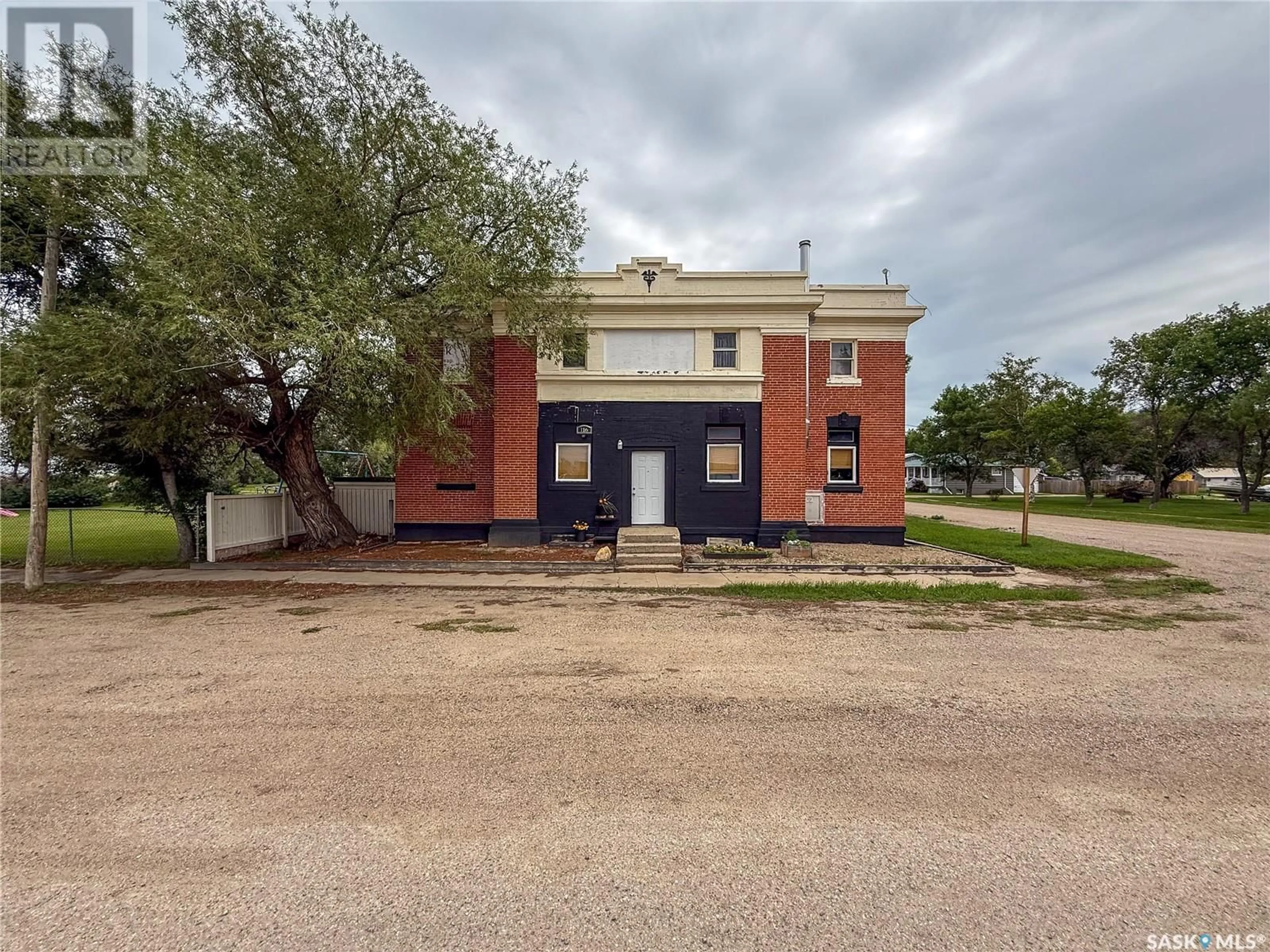 A pic from outside/outdoor area/front of a property/back of a property/a pic from drone, building for 116 MAIN STREET, Wiseton Saskatchewan S0L3M0