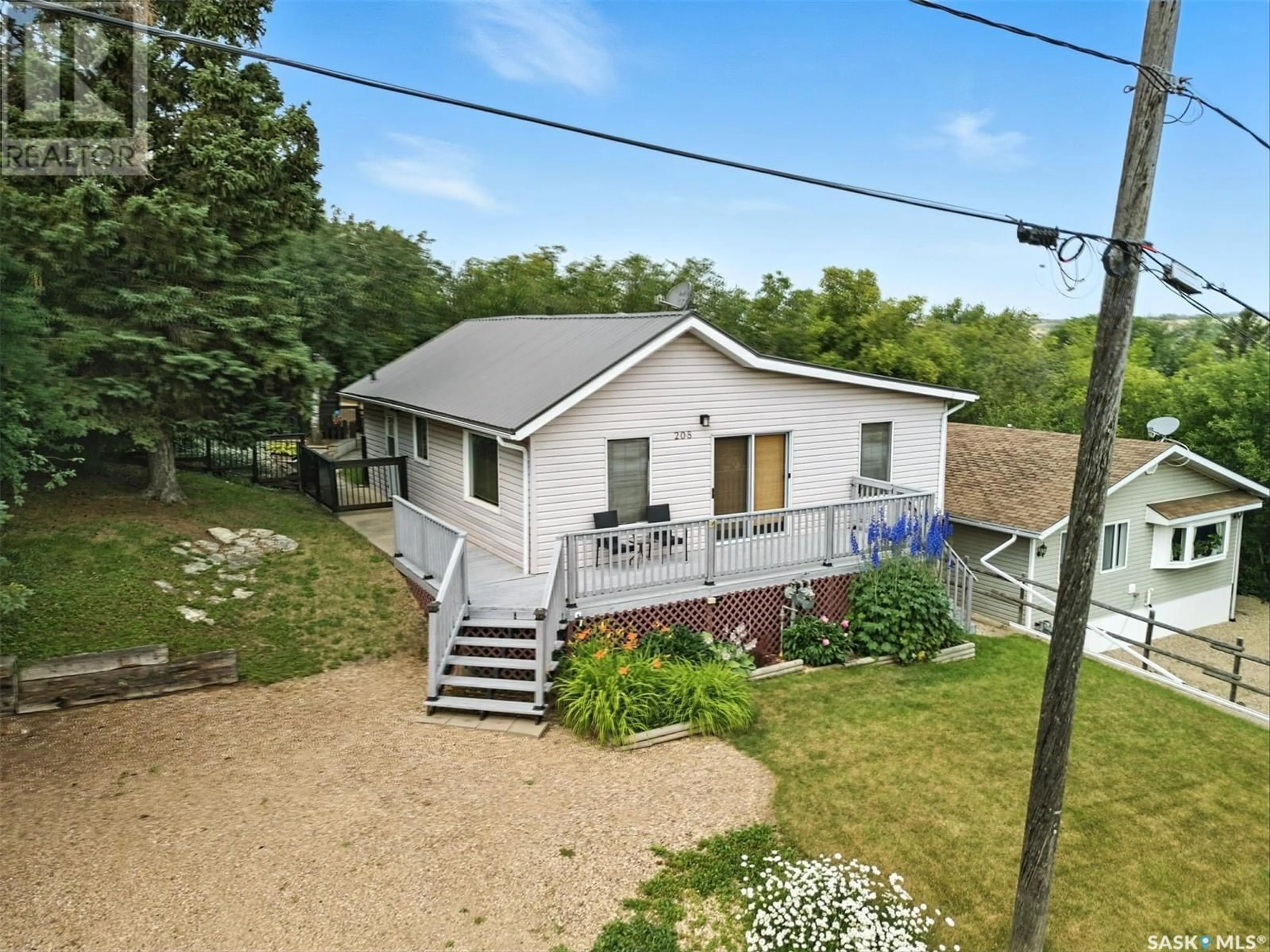 A pic from outside/outdoor area/front of a property/back of a property/a pic from drone, unknown for 208 ALBERT STREET, Manitou Beach Saskatchewan S0K4T1