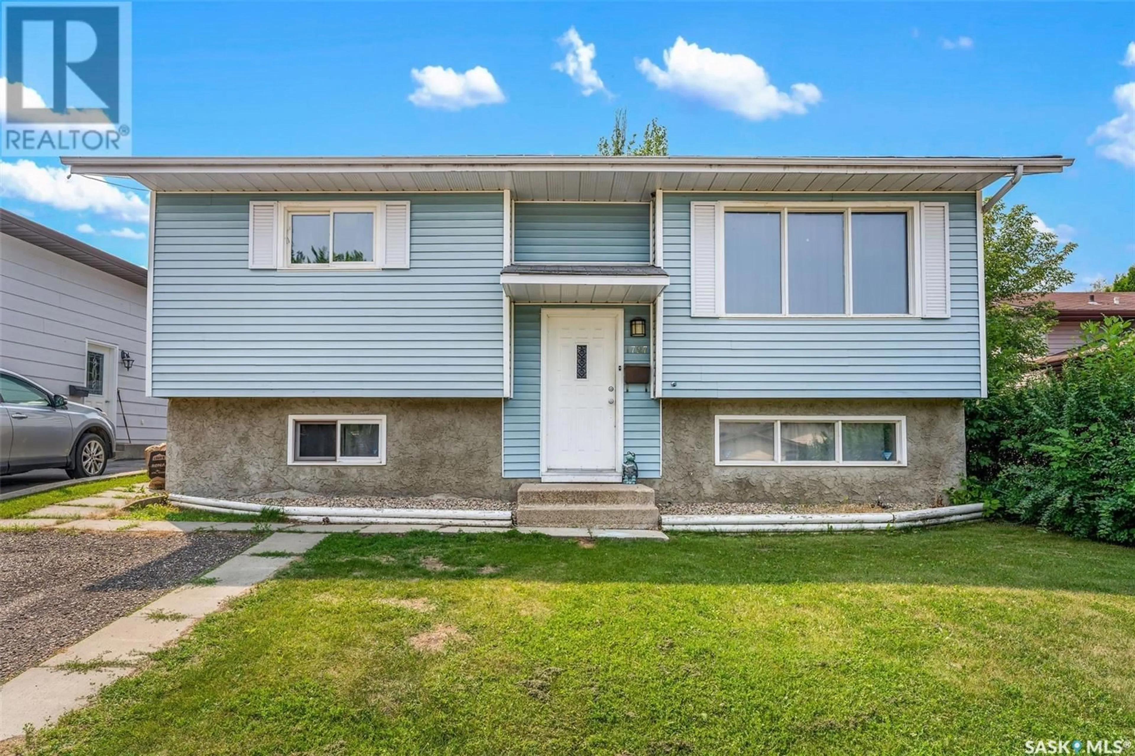 Home with vinyl exterior material, street for 1727 DAISLEY ROAD, Prince Albert Saskatchewan S5V7E3