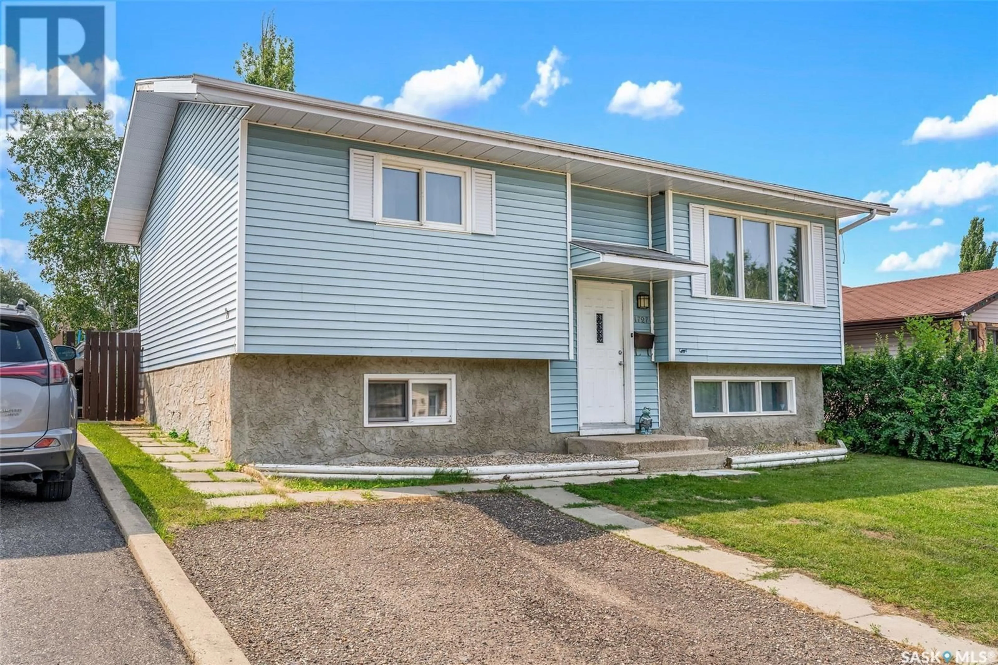 Home with vinyl exterior material, street for 1727 DAISLEY ROAD, Prince Albert Saskatchewan S5V7E3