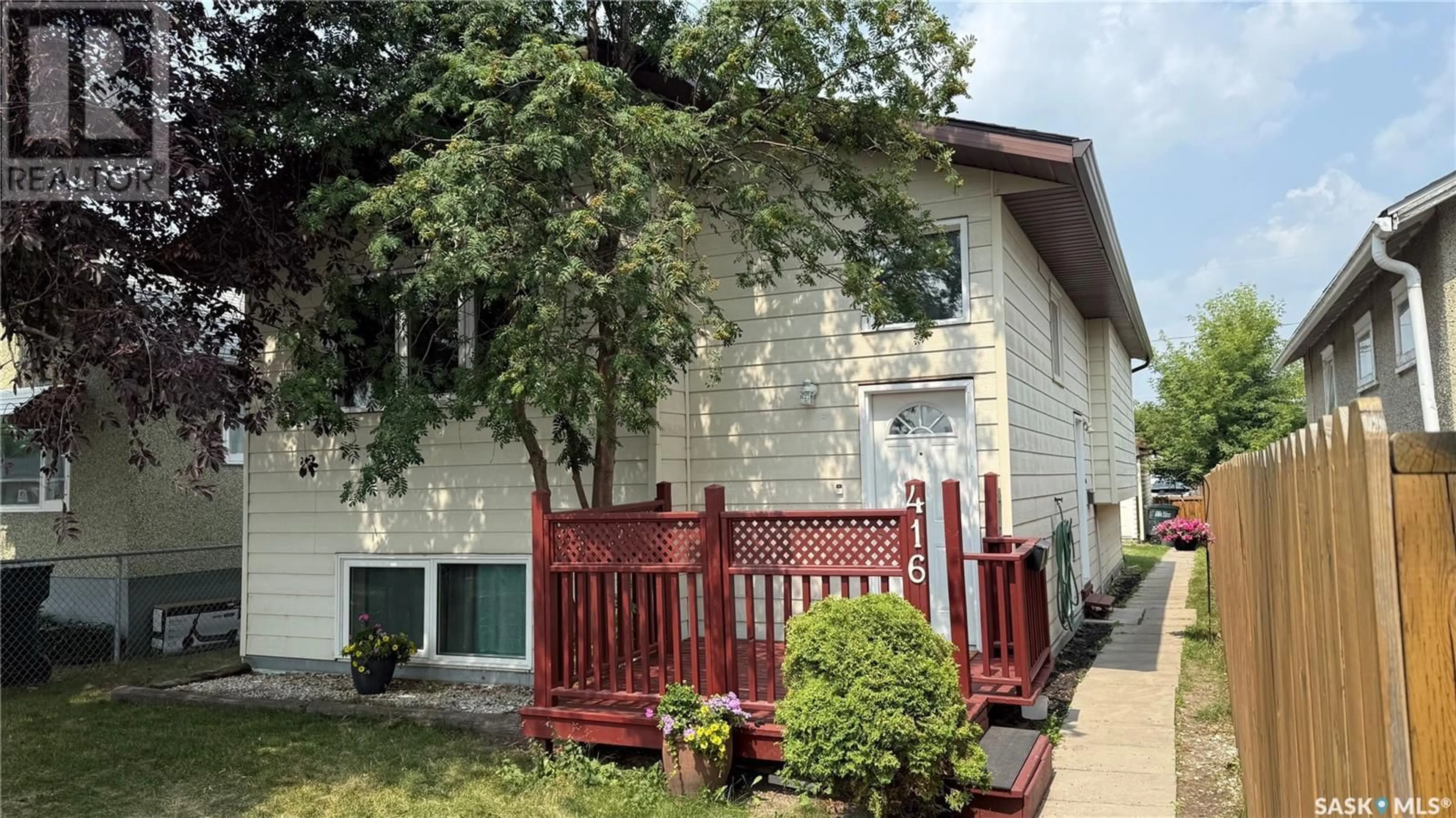 Home with vinyl exterior material, street for 416 13TH STREET, Prince Albert Saskatchewan S6V1E3