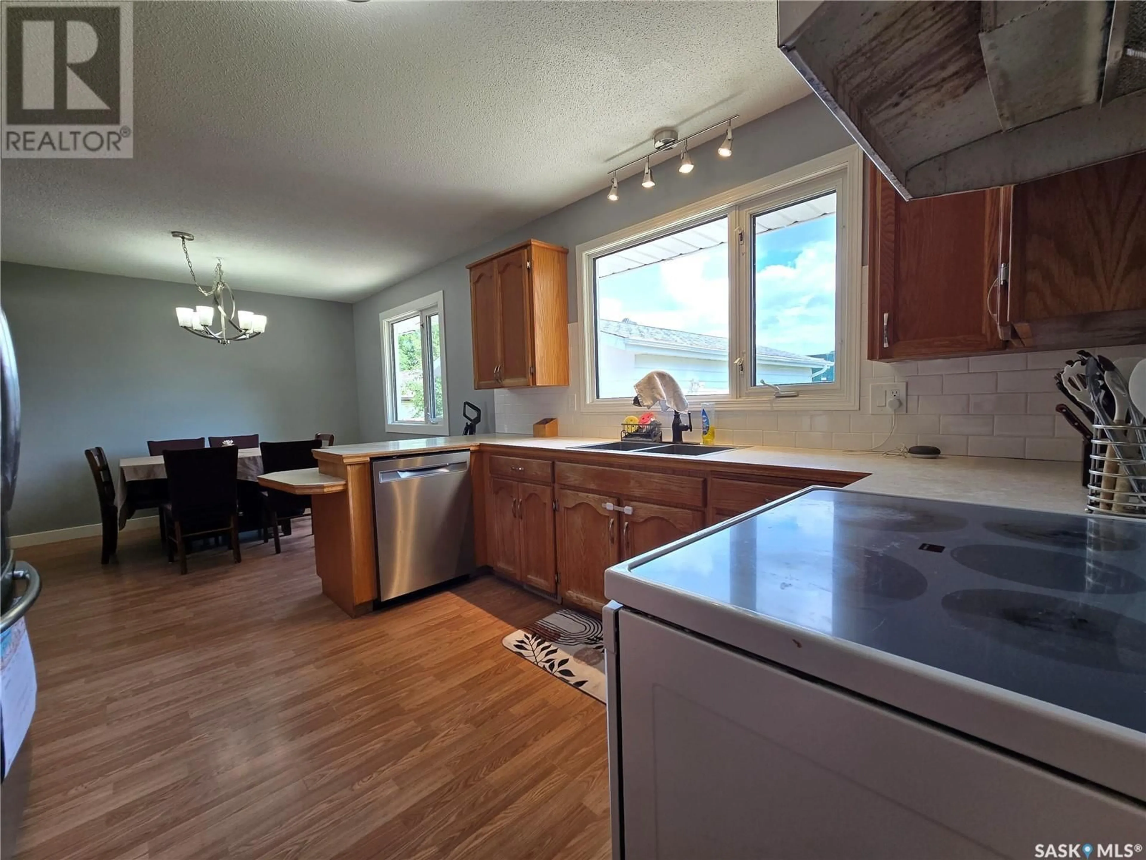 Open concept kitchen, unknown for 8 HARTNEY BAY, Weyburn Saskatchewan S4H0M1