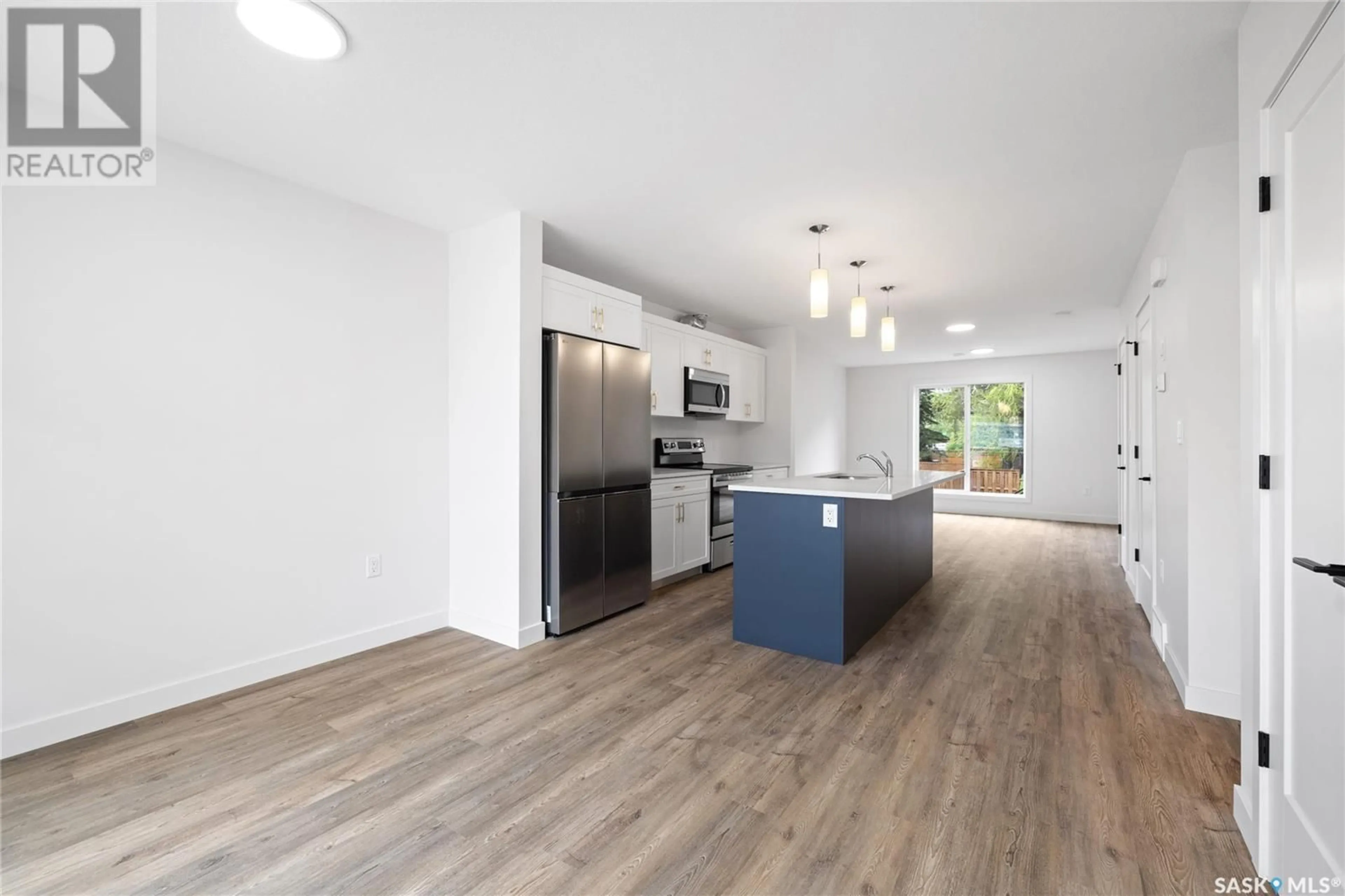 Open concept kitchen, wood/laminate floor for A/B - 1 3RD AVENUE, Lumsden Saskatchewan S0G3C0