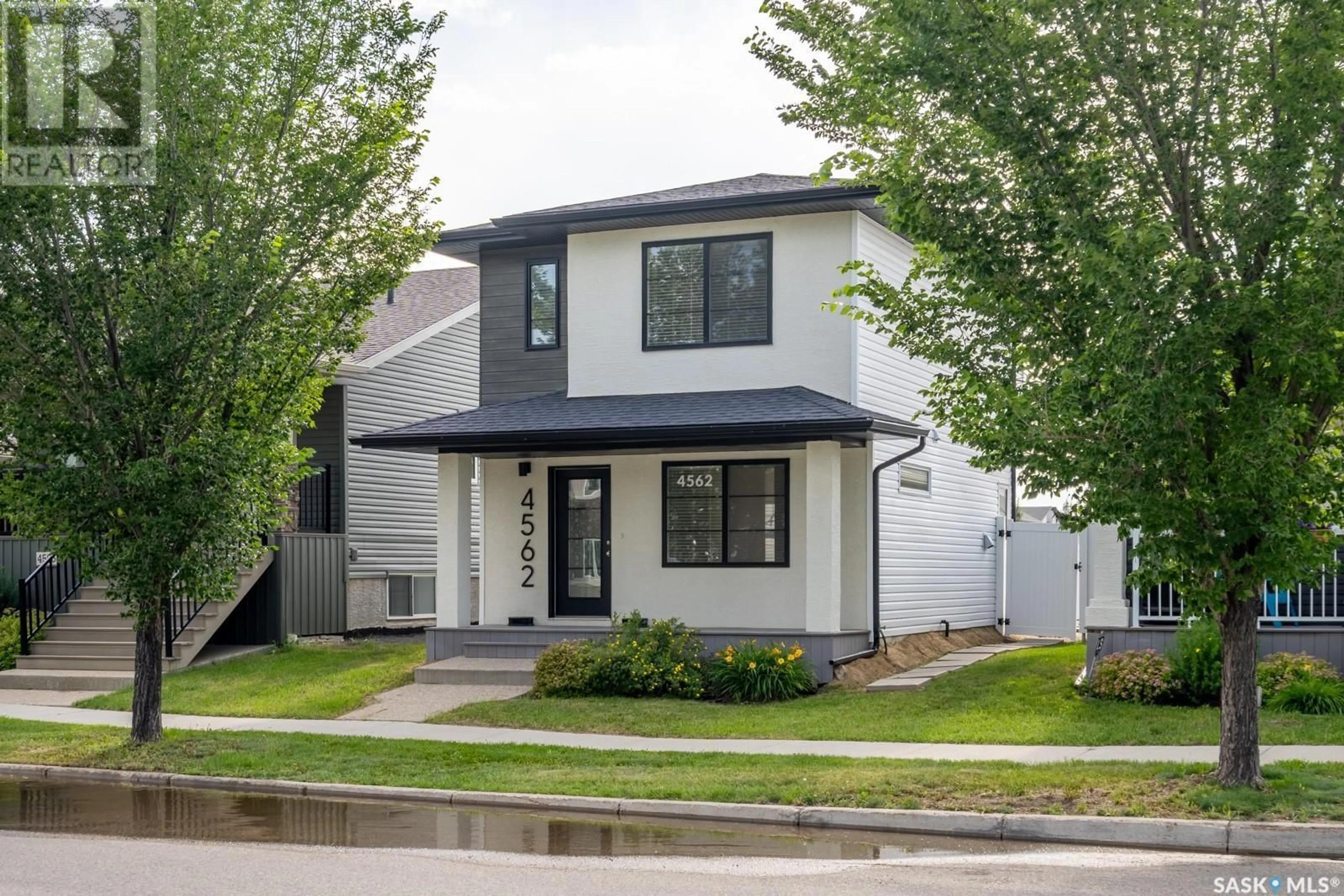 Home with vinyl exterior material, street for 4562 JAMES HILL ROAD, Regina Saskatchewan S4W0K8