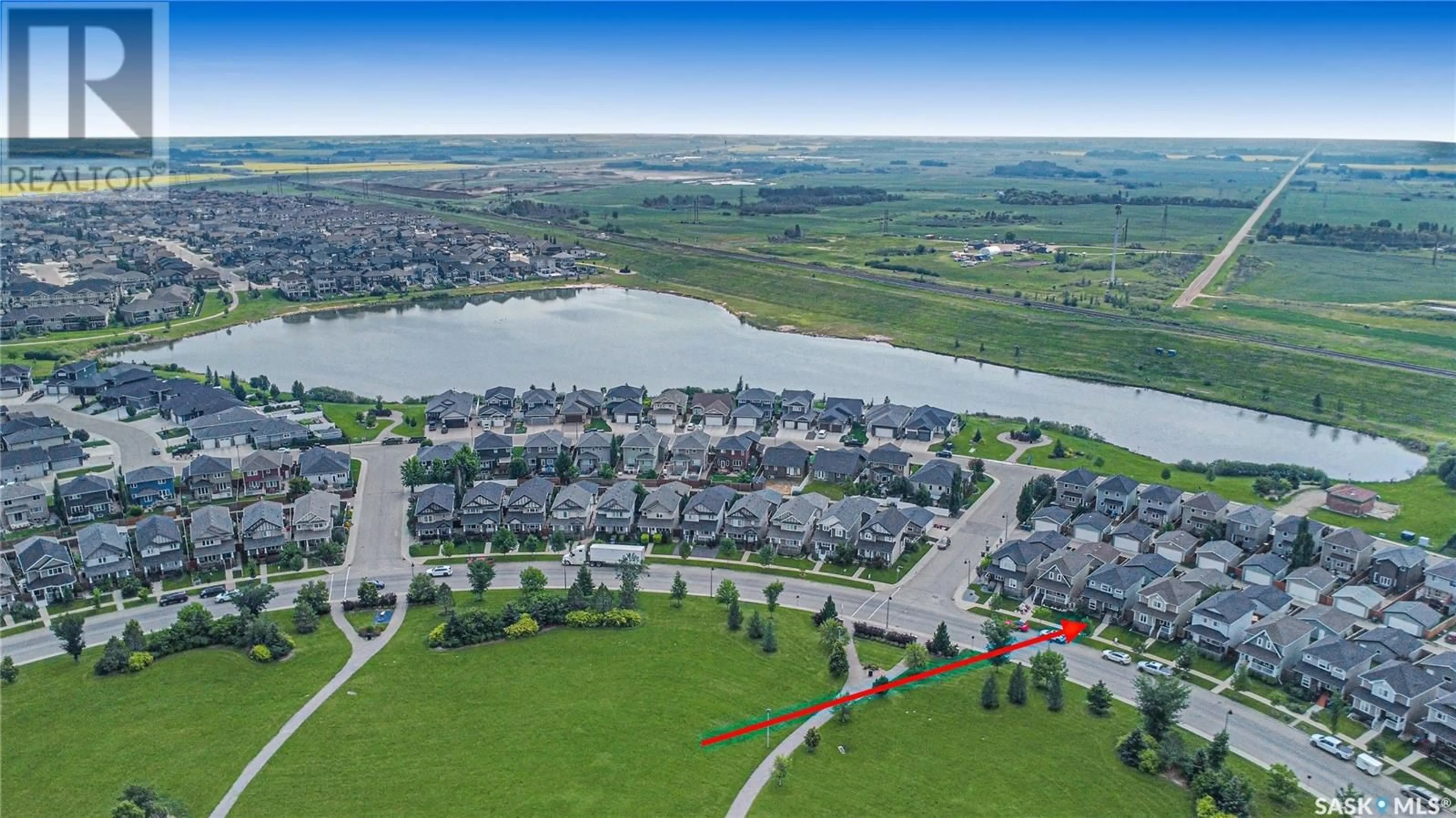 A pic from outside/outdoor area/front of a property/back of a property/a pic from drone, water/lake/river/ocean view for 534 STONEBRIDGE COMMON, Saskatoon Saskatchewan S7T0N8